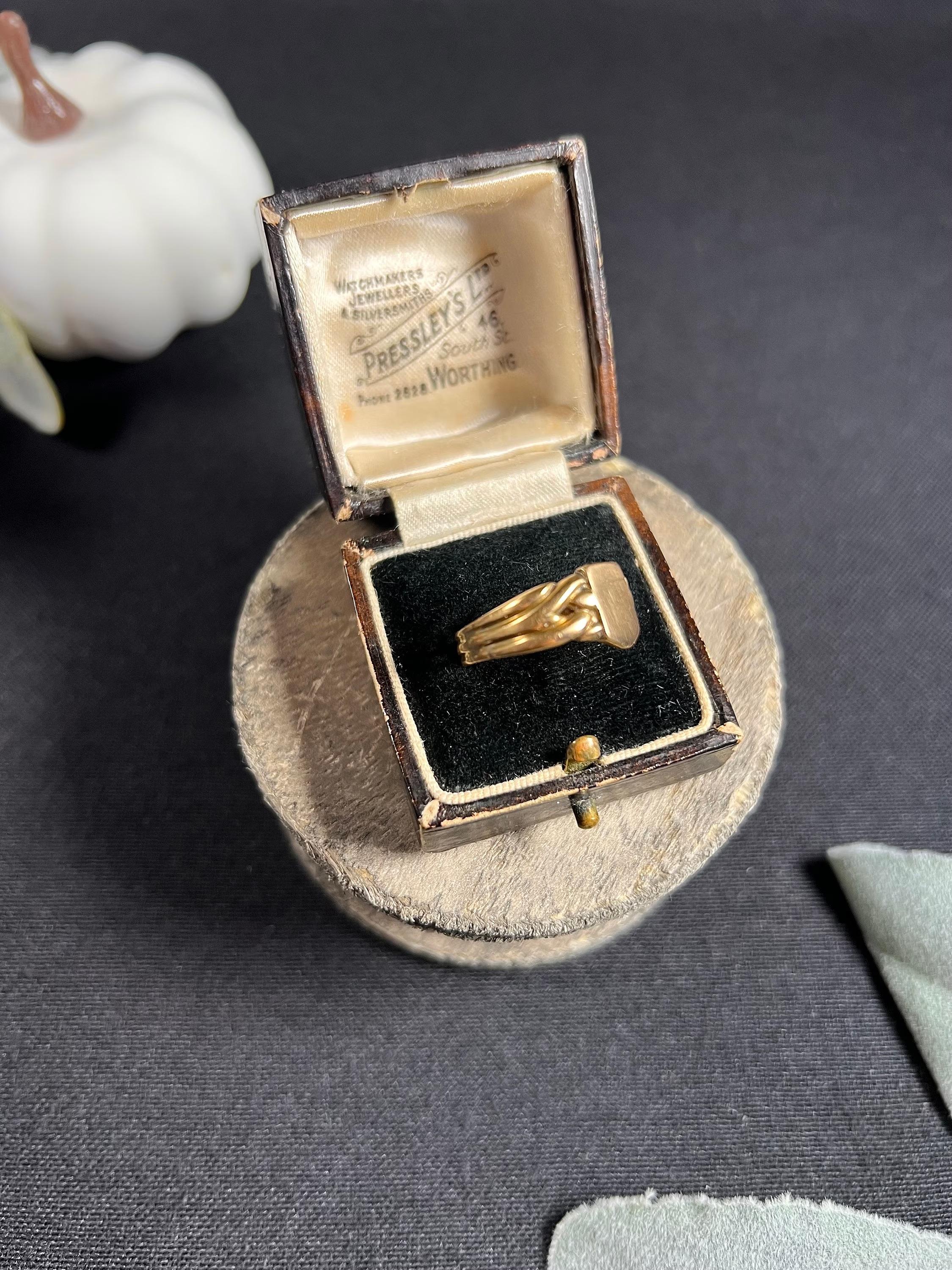 Antique Signet Ring

18ct Gold

Hallmarked Birmingham 1889

This antique signet ring is a true masterpiece in 18ct yellow gold. It features a stunning shield-shaped design that is typical of Victorian-era jewellery. The woven shoulders add an