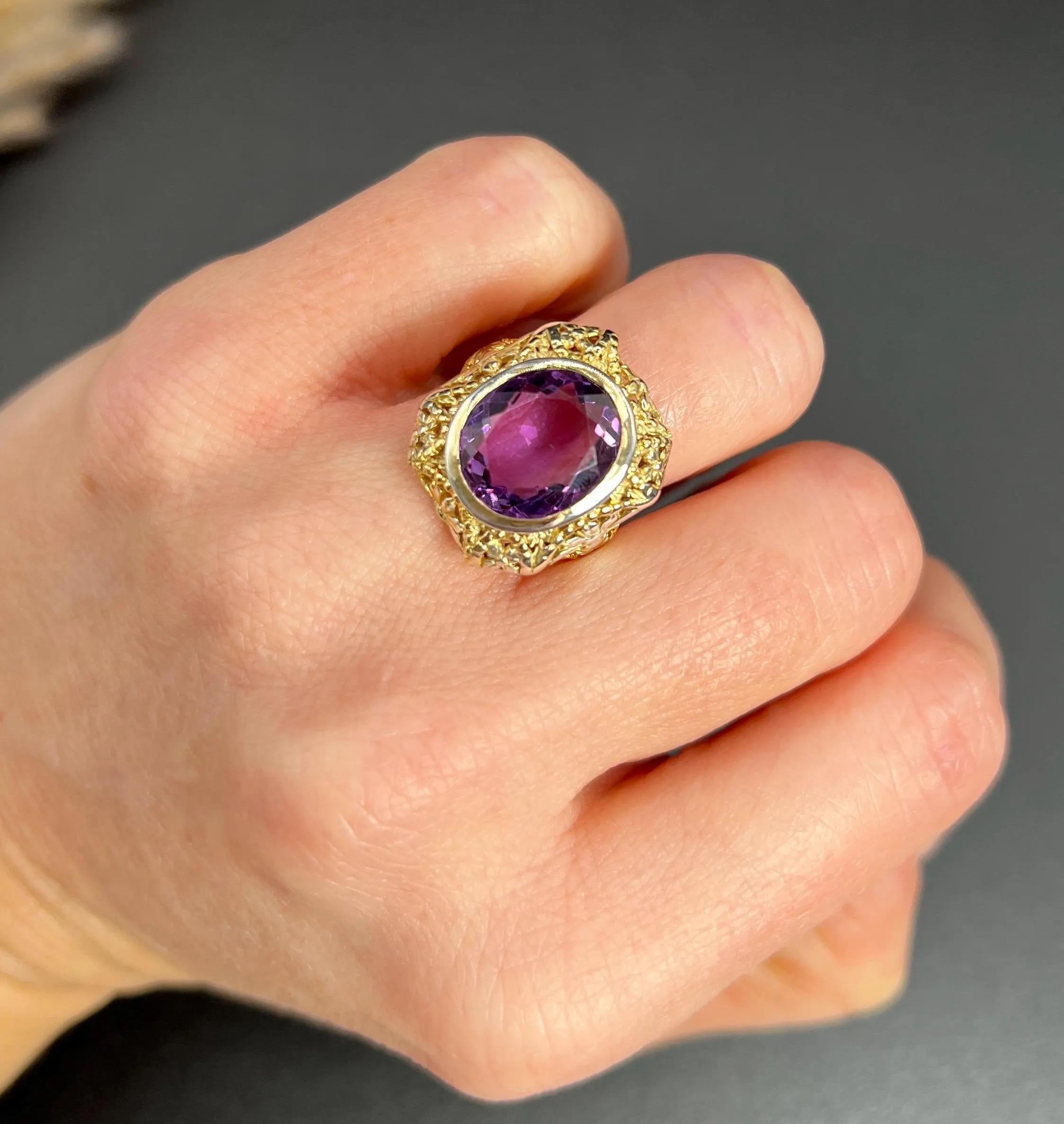 Antique Amethyst Ring

18ct Yellow & White Gold Tested

Circa 1910-1920

This exquisite 18ct two-tone gold Art Nouveau ring beautifully captures the essence of the era with its elegant design. At the heart of the ring is a captivating faceted oval
