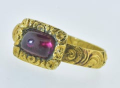 Anello antico in 18 carati e granato,  Inscritto e datato 1712-1765.