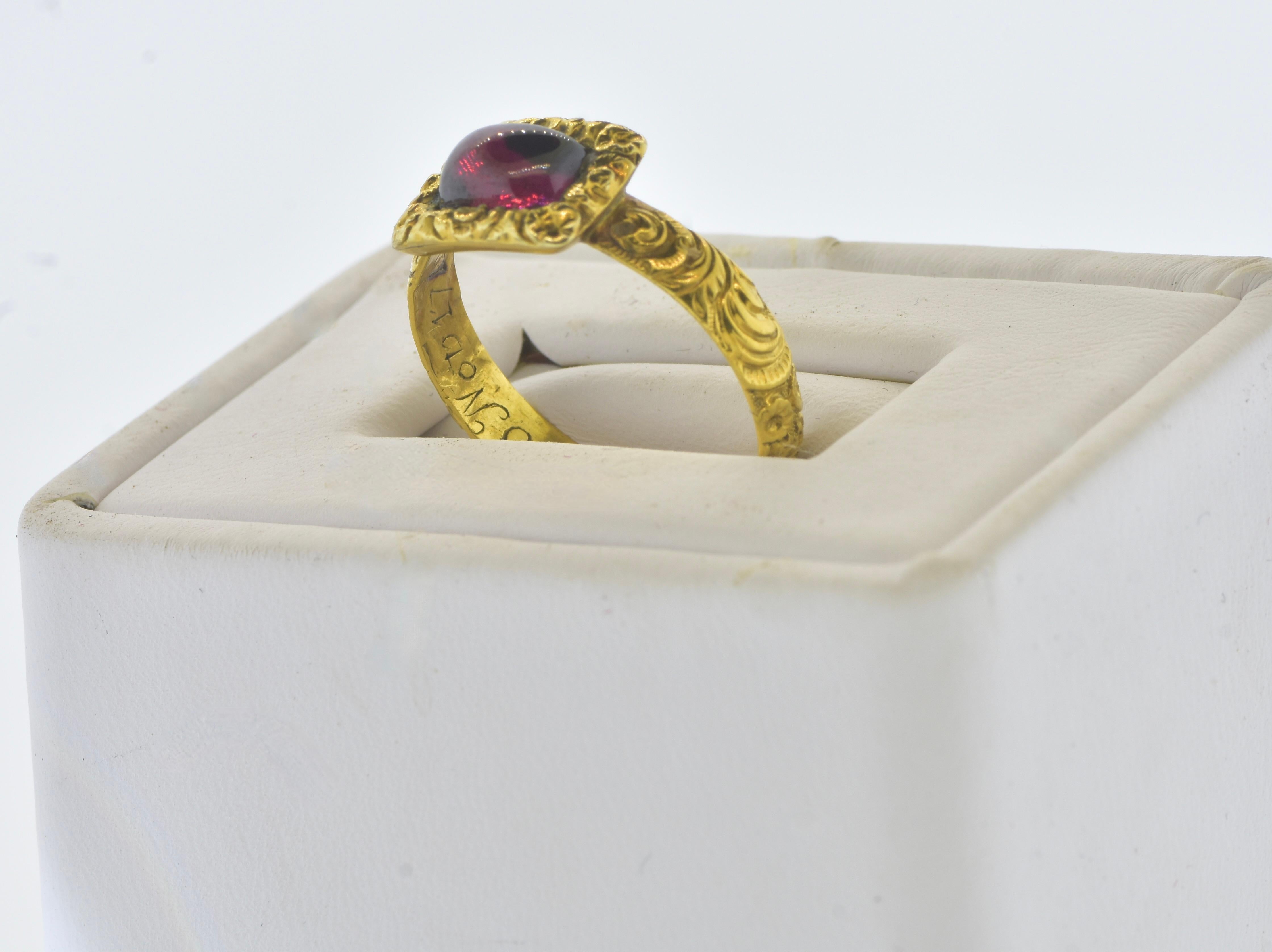 Cabochon Antique 18K and Garnet Ring,  Inscribed and dated 1712-1765.