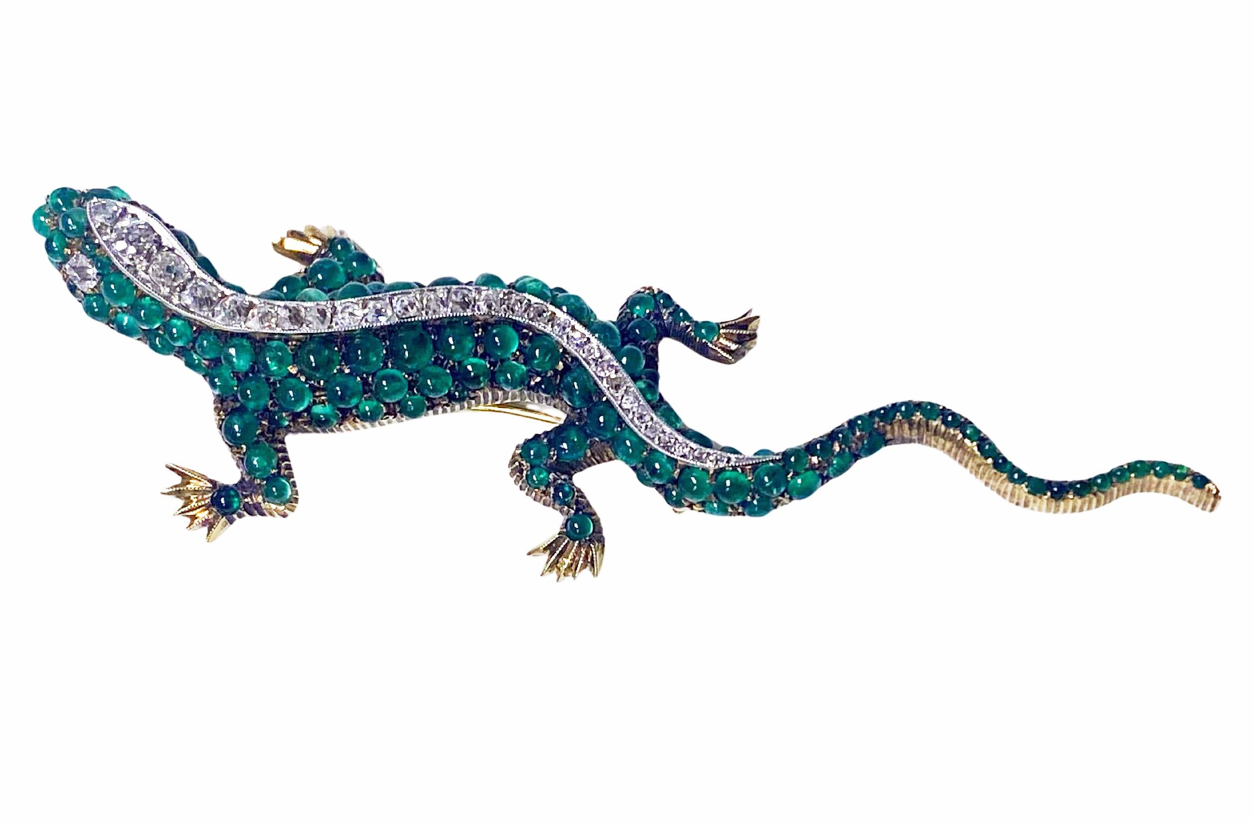 Antique 18K Emerald and Diamond salamander brooch C.1900. Superb condition, this large salamander is set with 30 old mine cut diamonds, approximately 1.30 ct total diamond weight and approximately 160 original cabochon emeralds all mounted in 18K