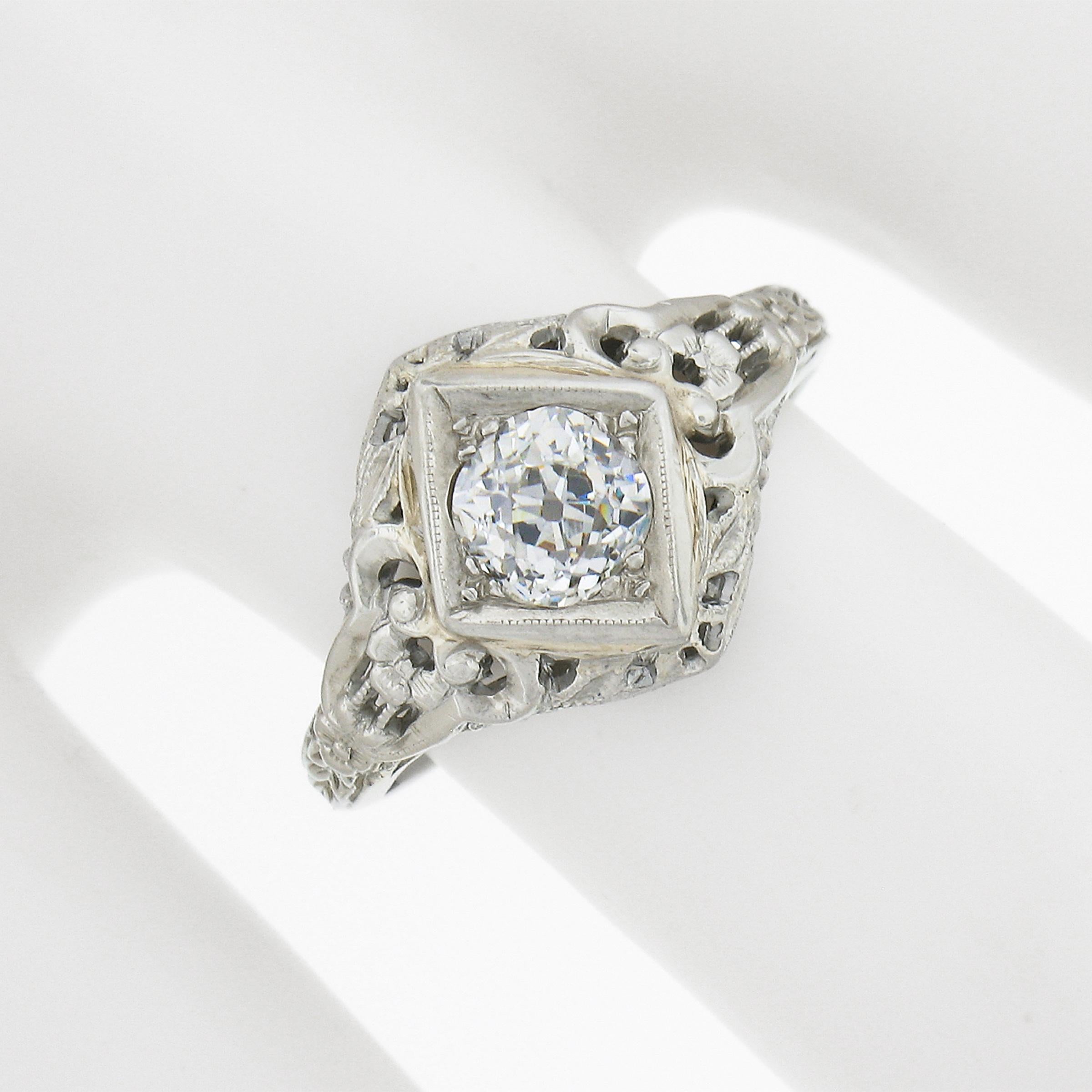 Antique 18k Gold 0.60ct Old Mine Cushion Diamond Floral Filigree Engagement Ring In Excellent Condition For Sale In Montclair, NJ