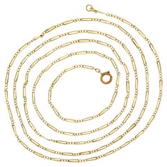 Antique Collier en or 18 carats 59", chaîne à maillons longs, alternés et torsadés.