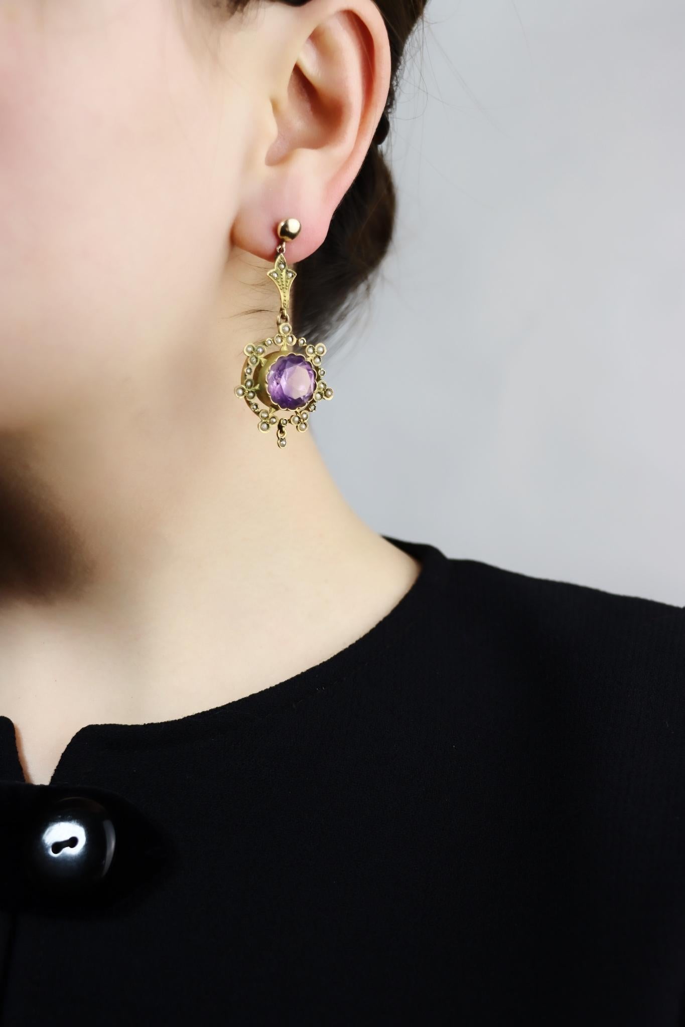 Antique 18K Gold Amethyst Pearl Drop Earring

Marked:
18K

Approximate Dimensions:
5 cm (Length) 
2.5 cm (Width)
13.4 mm (Amethyst)
14.1 grams in weight.