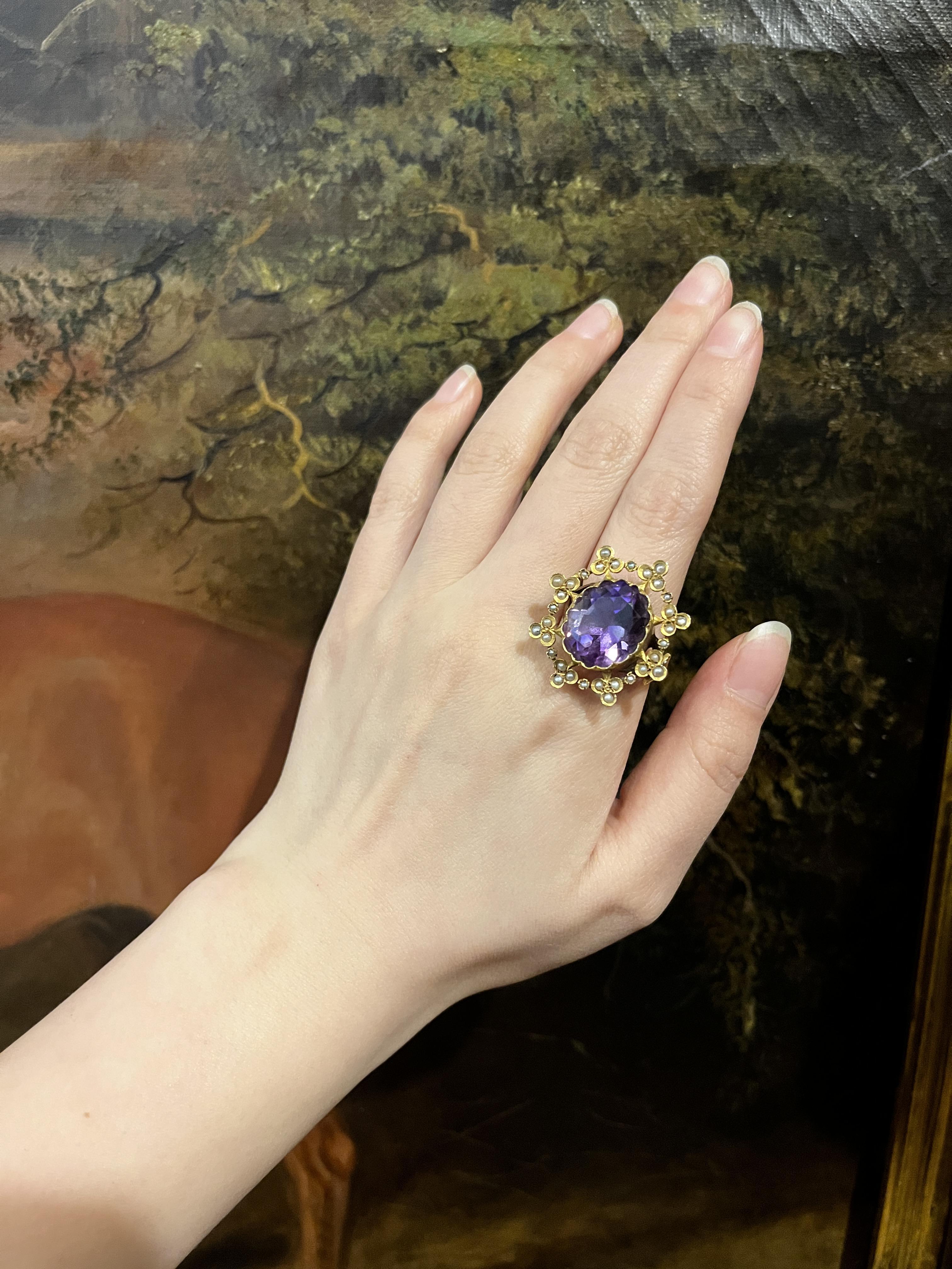 Antique 18K Gold Amethyst Pearl Ring

Marked:
18K

Approximate Dimensions: 
10 (Ring Size) 
3 cm (Width)
16.36 x 13.64 mm (Pearl)
10.7 grams in weight.