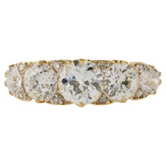 Antique bague à cinq pierres en or 18K et diamants