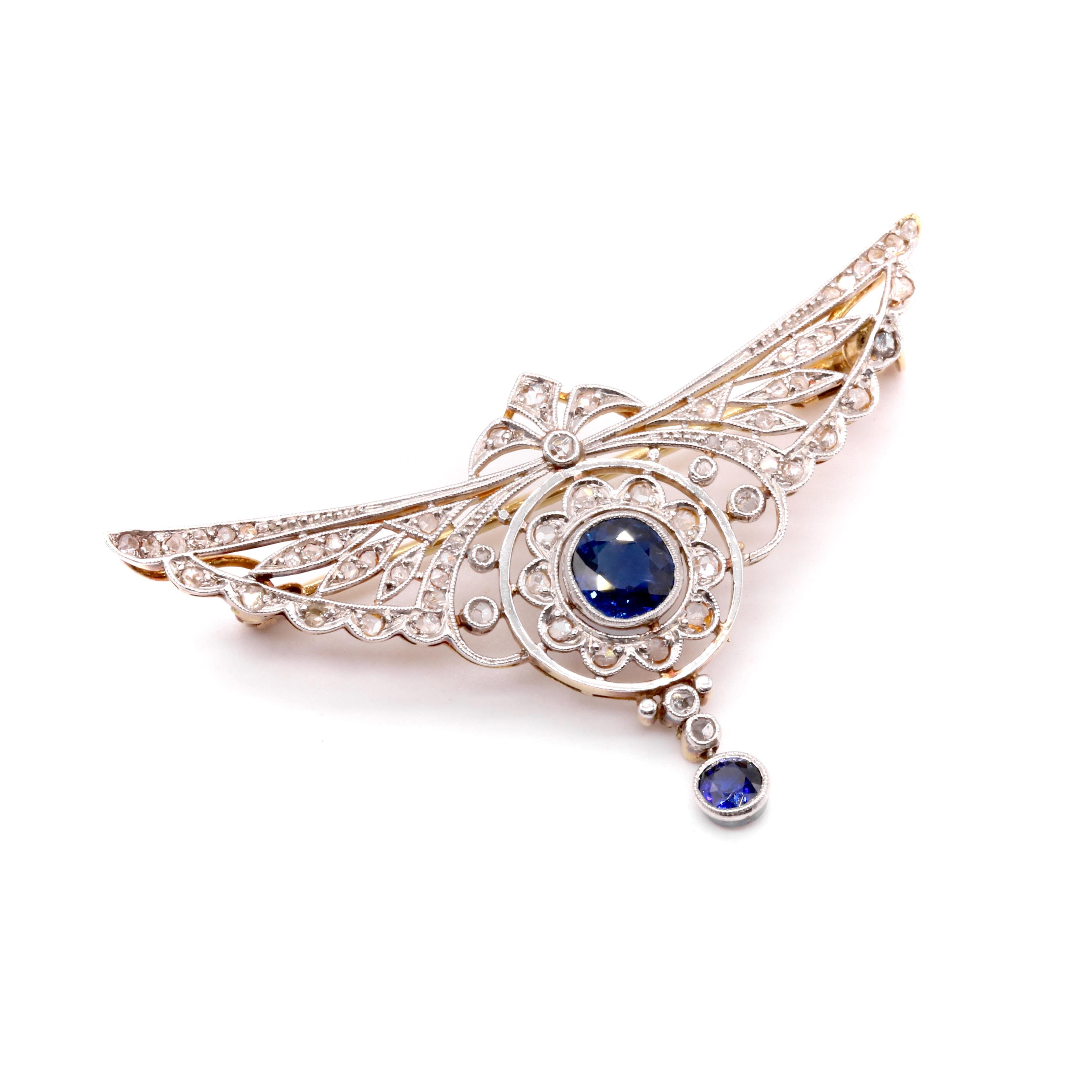 Round Cut Antique 18K Gold and Platinum 0.7ct Sapphire and Diamond Openwork Winged Brooch