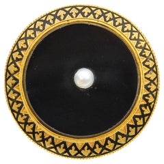 Antike Brosche aus 18 Karat Gold mit schwarzer Emaille und Onyx