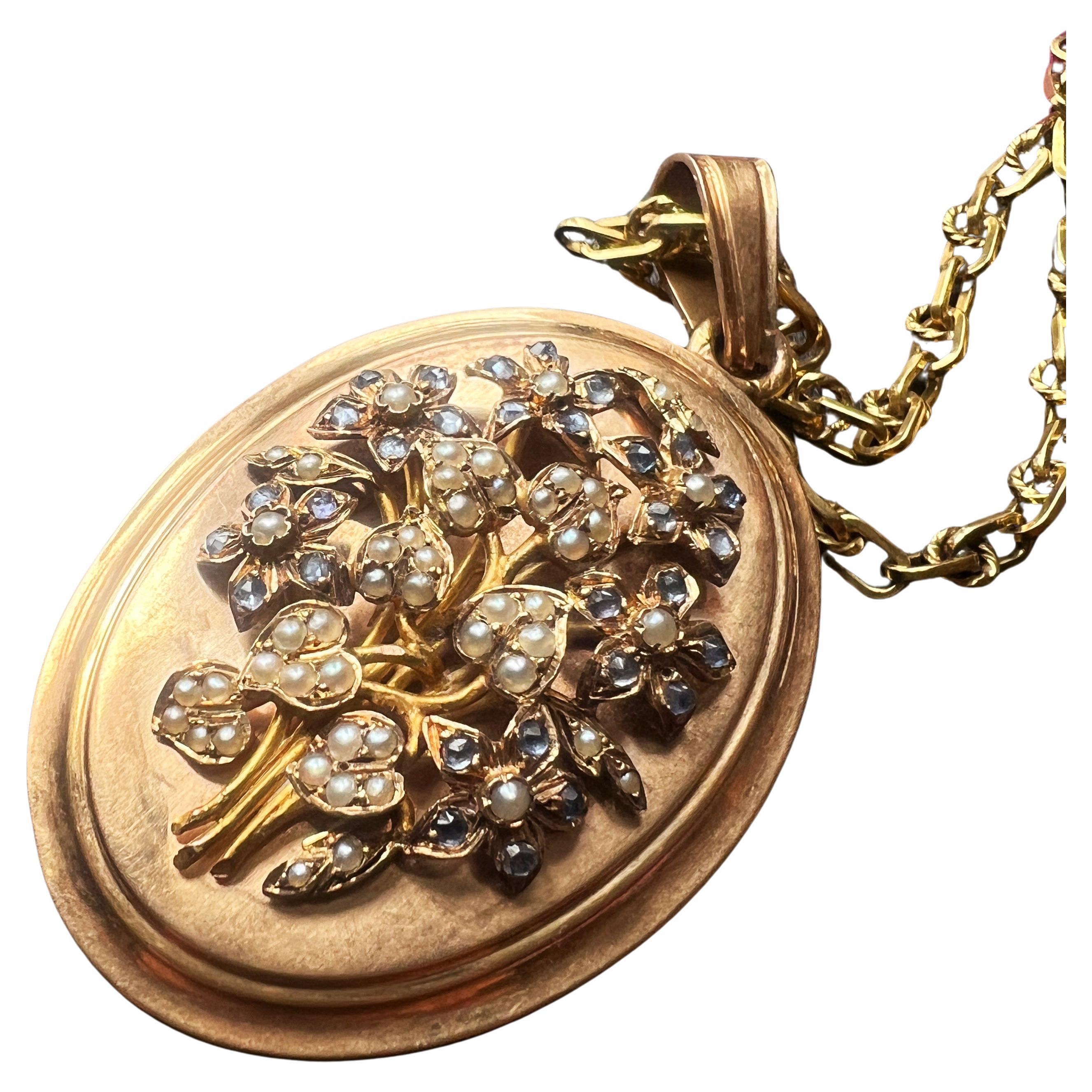 Antique 18K gold blue sapphire natural pearl flowers locket pendant For Sale