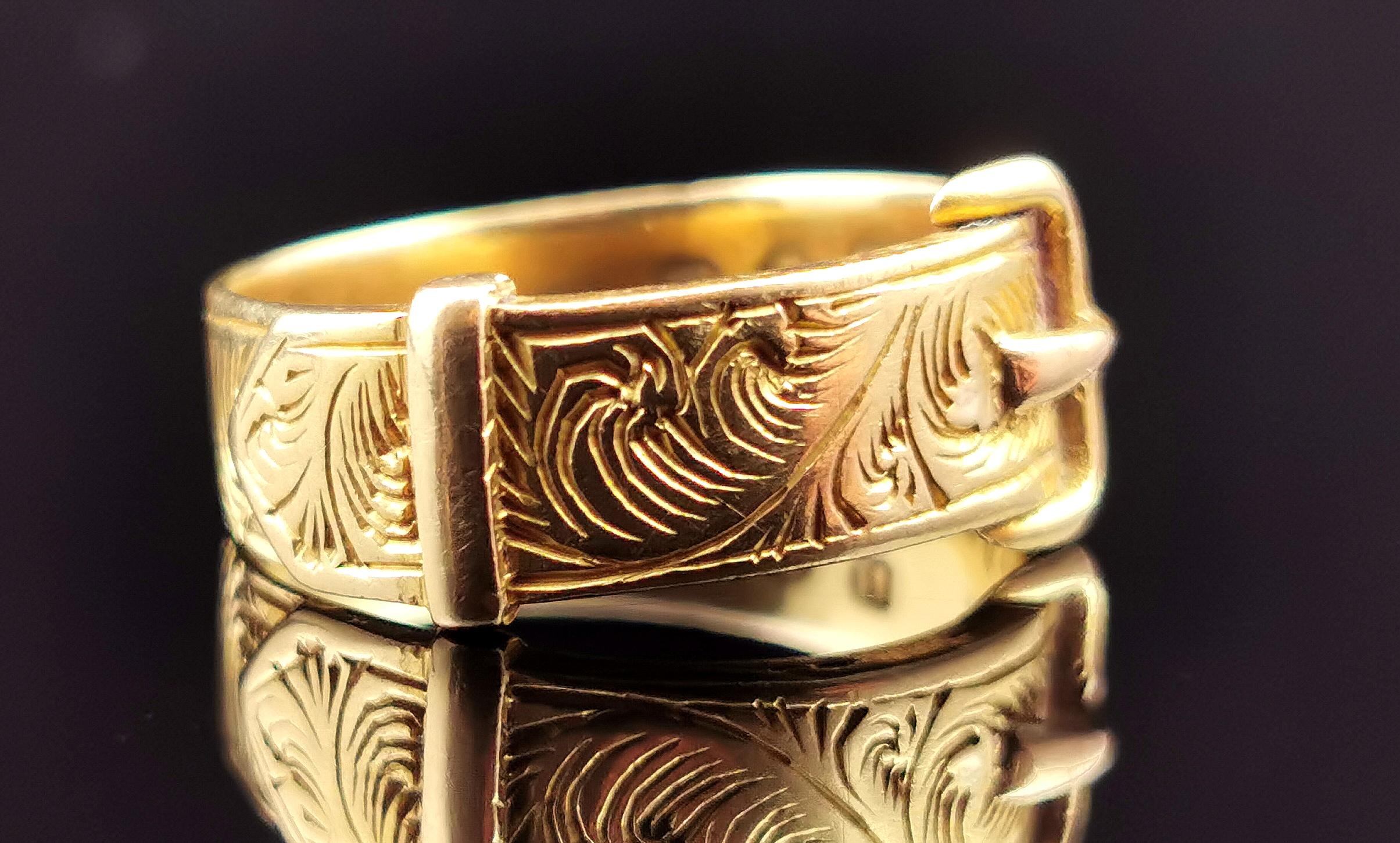 gold belt buckle ring meaning
