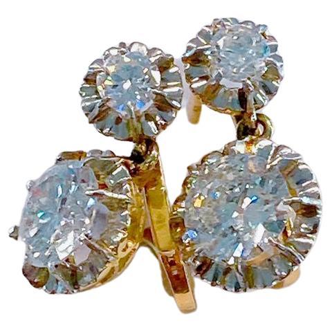 Antique 18k yellow and white gold dangling earrings with 4 old european cut diamonds with a total diamond weight of 2.30 carats smaller diamonds 0.15ct each and larger diamond 1 carat each diamond descriptian H color white and vs2 clearity inclusion