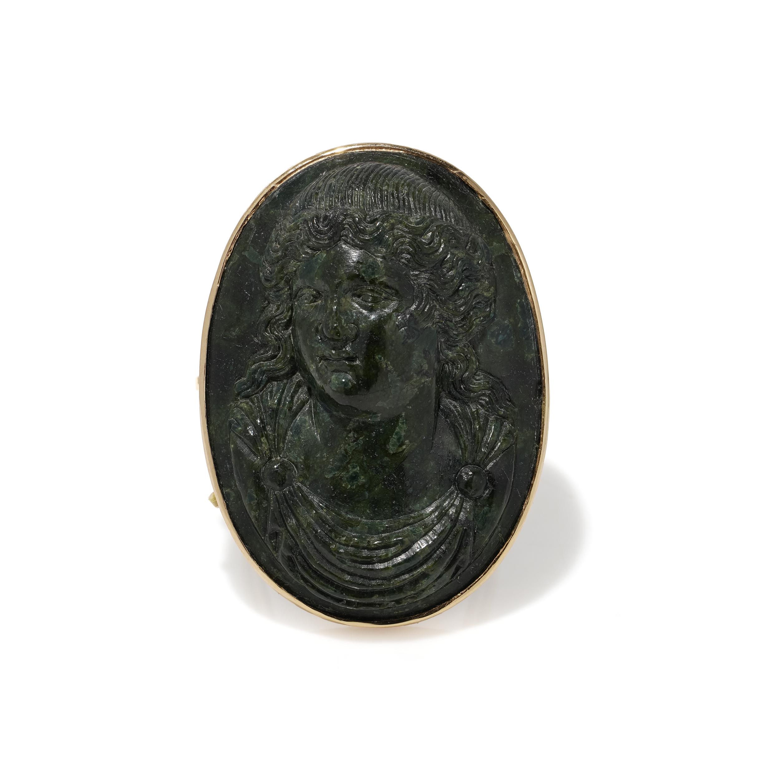 Antique 18K Gold Green Hardstone Cameo Ring Depicting Alexander The Great
Made in Circa 19th century. 

A striking antique ring featuring an intricately carved green hardstone cameo depicting Alexander the Great in high relief. The masterfully