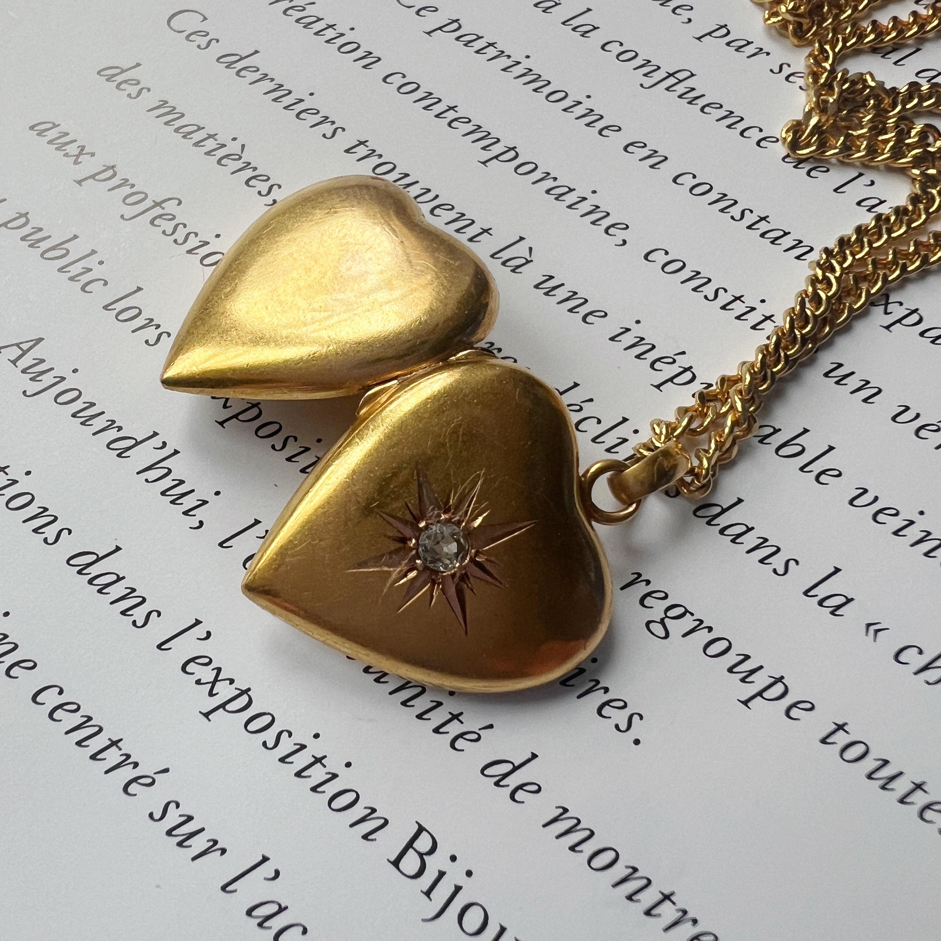 For sale a very sweet 18K gold heart-shaped photo locket pendant, a timeless piece that seamlessly blends romance and a touch of antique charm.

The pendant features a heart shape, symbolizing enduring love and commitment. Cast in warm, buttery 18K
