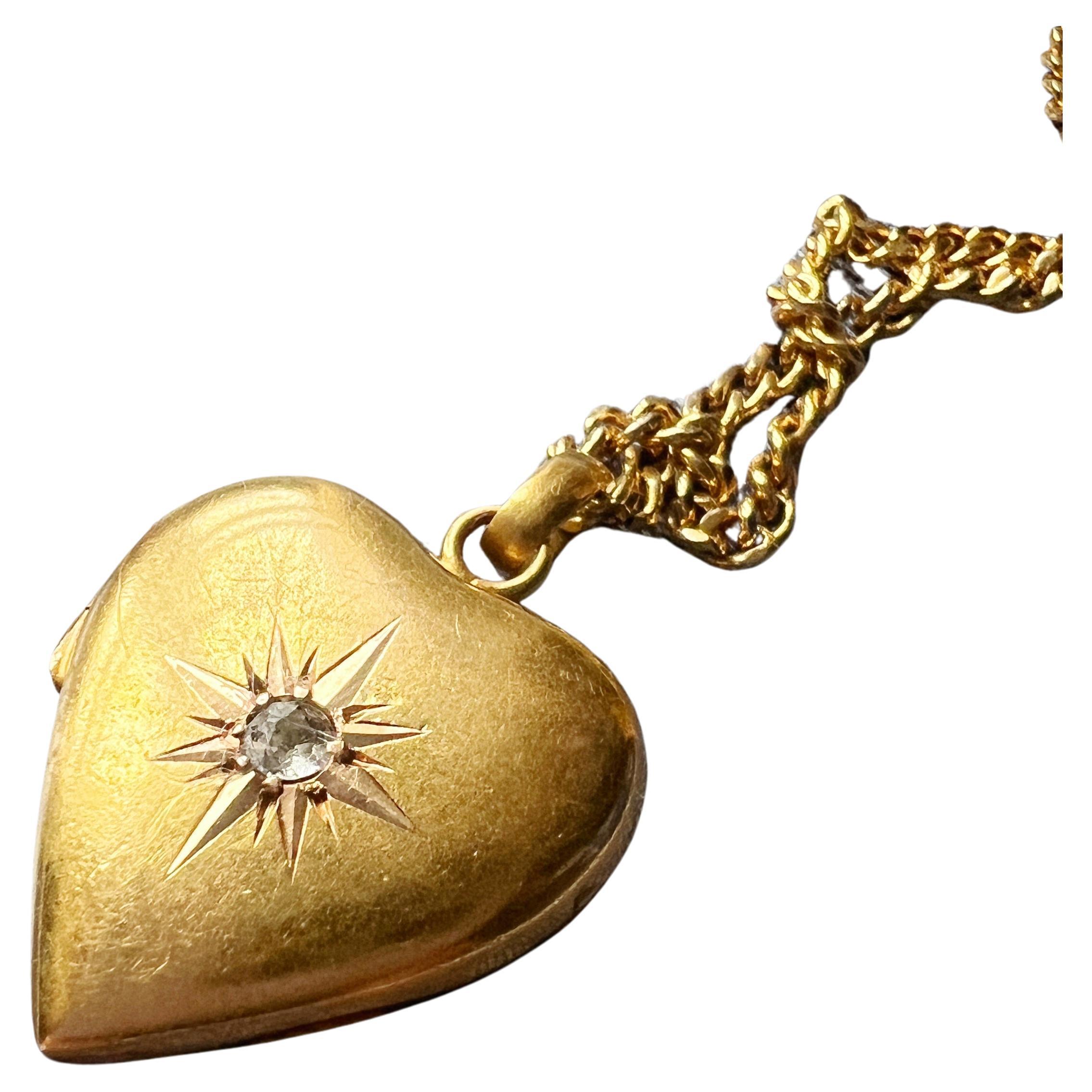 Antique 18K gold heart shaped diamond star locket pendant