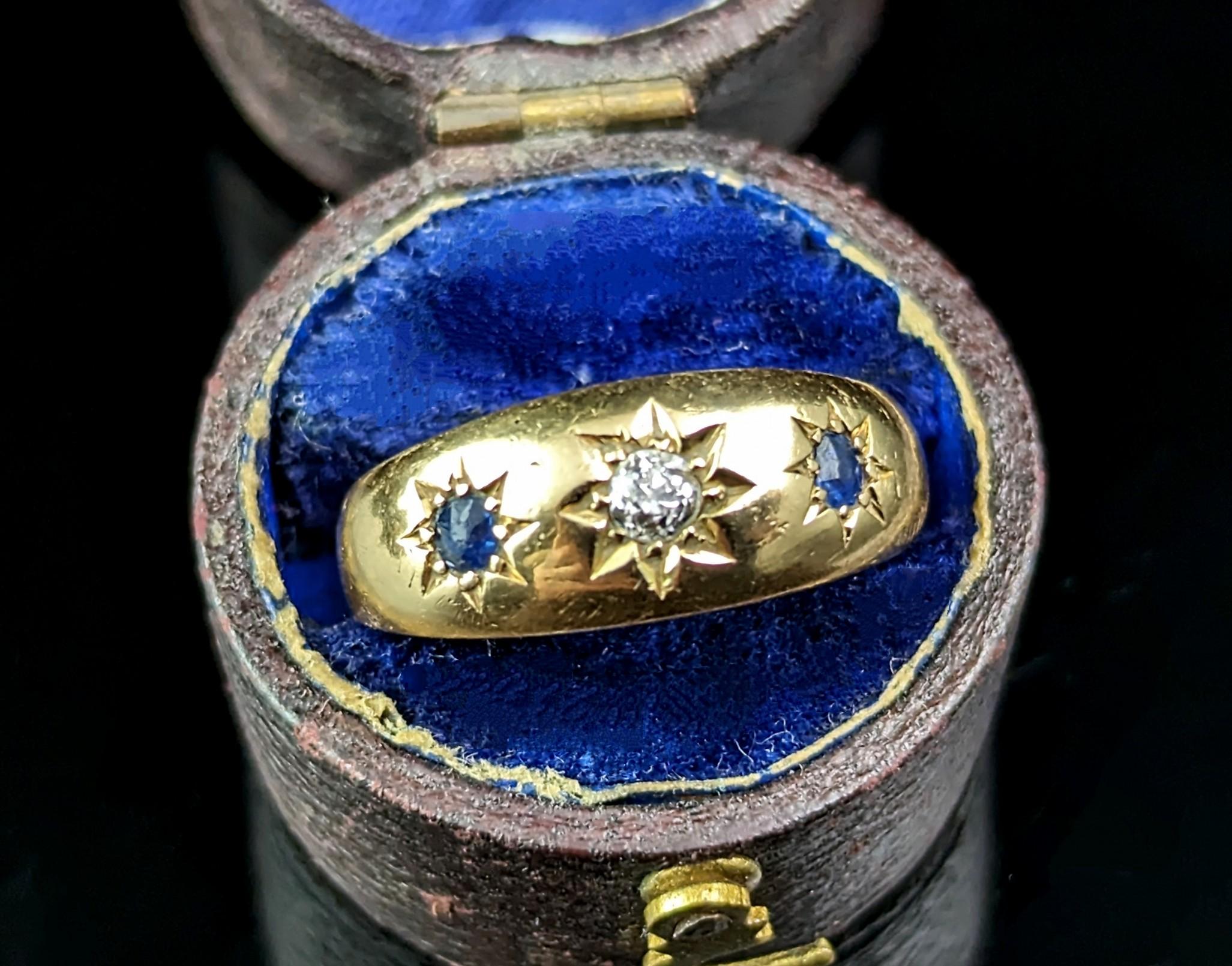 You can't help but fall in love with this beautiful antique Star set diamond and Sapphire ring.

Set in rich buttery 18ct gold, the iconic star shaped setting giving a lovely celestial touch.

It feature a single old cut diamond to the centre