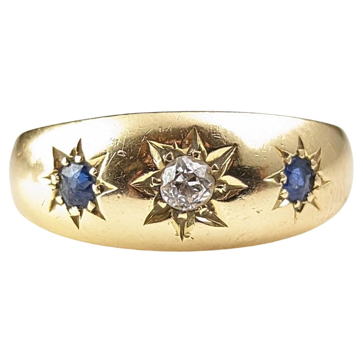 Antiker Ring aus 18 Karat Gold mit Saphiren und Diamanten in Sternfassung 