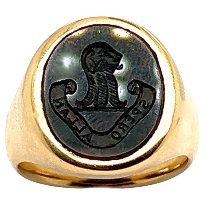 Bague de chevalière ancienne en or 18K avec intaille en pierre de sang