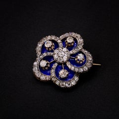 Antike Brosche aus 18 Karat Gold und Silber mit 2,98 Karat Diamant im Altschliff und blauer Emaille