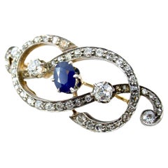 Antique 18k Gold Silver Top Sapphire 2.35 Ct. OEC Diamond  "Love Knot" Brooch