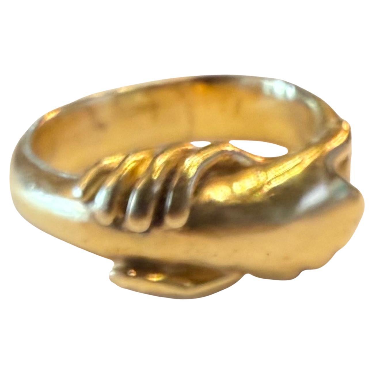 The two clasped hands on this Victorian heavy yellow gold fede ring signifies friendship or love.  The fede ring is an Italian term and signifies 2 hands clasped in faith, or 