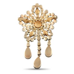 Broche ancienne en or rose 18 carats et argent avec 1,50 carats de diamants et d'émeraudes