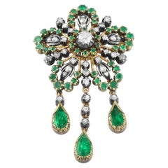 Broche ancienne en or rose 18 carats et argent avec 1,50 carats de diamants et d'émeraudes
