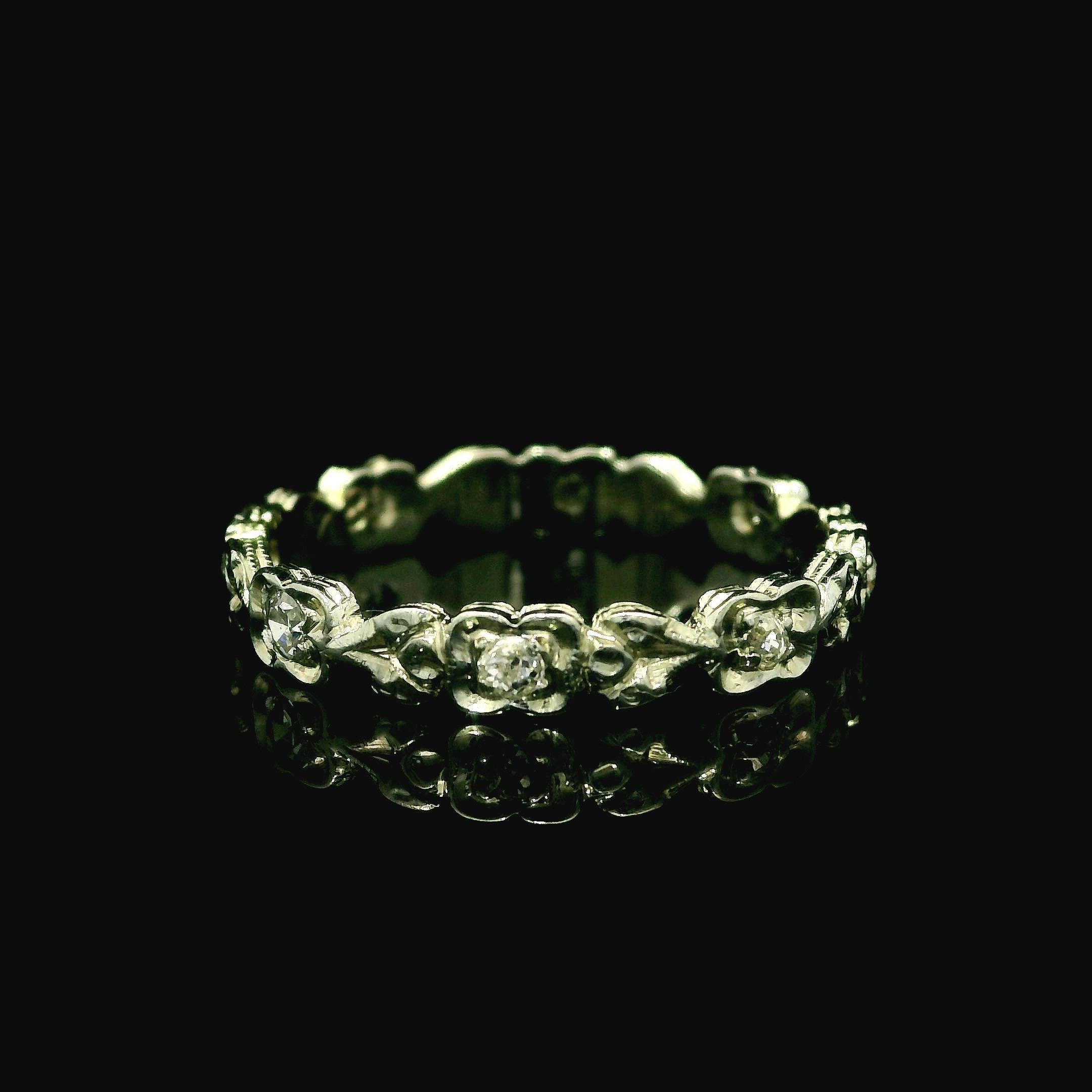 –Stone(s)–
(8) Natural Genuine Diamonds - Old Single/ European Cut - Pave Set - Nice White Color - 0.12ctw (approx.)

Material: Solid 18k White Gold
Weight: 1.92 Grams
Ring Size: 5.5 ( fitted on finger, item can not be sized)
Ring Width: 2.9mm