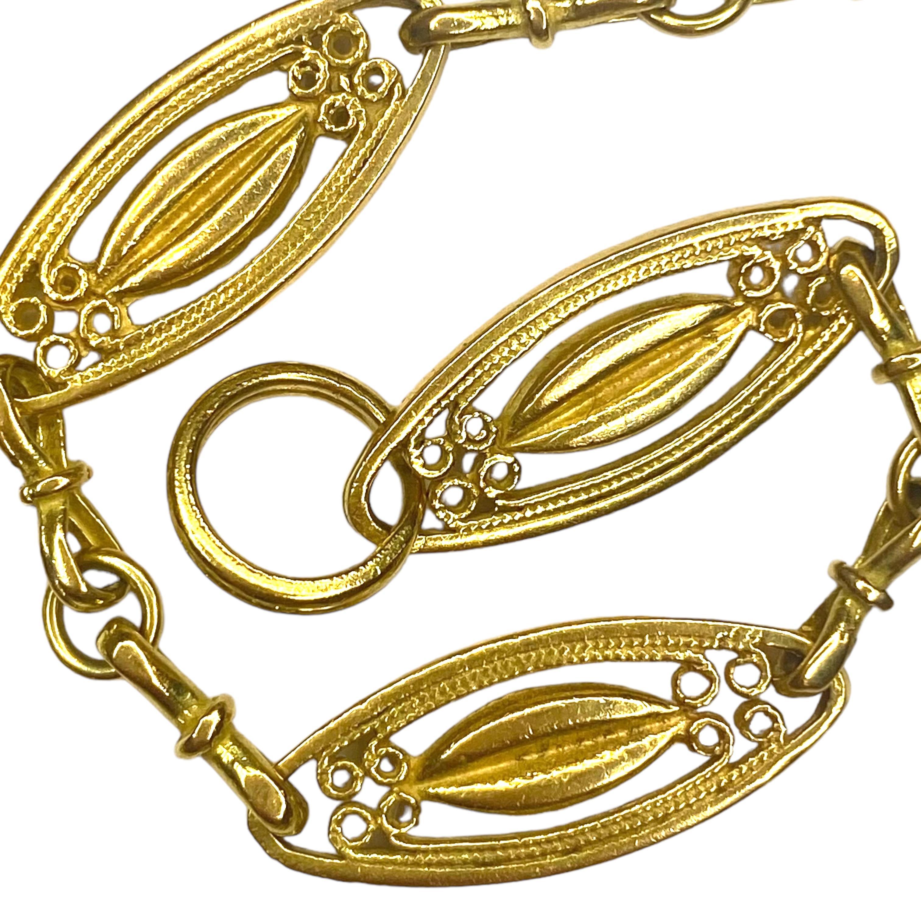 Crafted in 18K yellow gold, this solid specialty chain features a series of long navette links alternating with gold connector links .
The clasp is not original, but perfectly matches the color of the chain.
Measurements:
Length: 42 inches
Width: