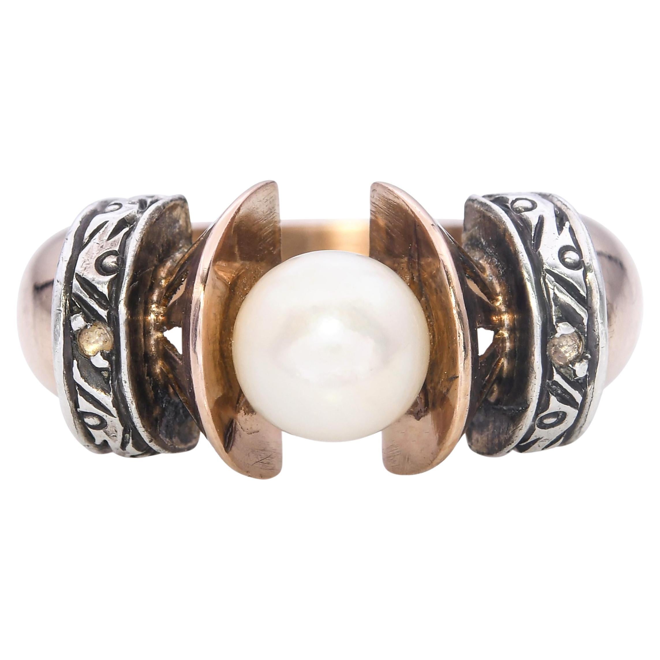 Bague ancienne en or jaune 18k et argent avec perles