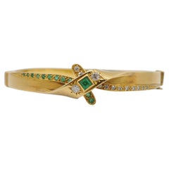 Bracelet ancien en or jaune 18 carats avec 12 émeraudes (0,40 carat) et 14 diamants