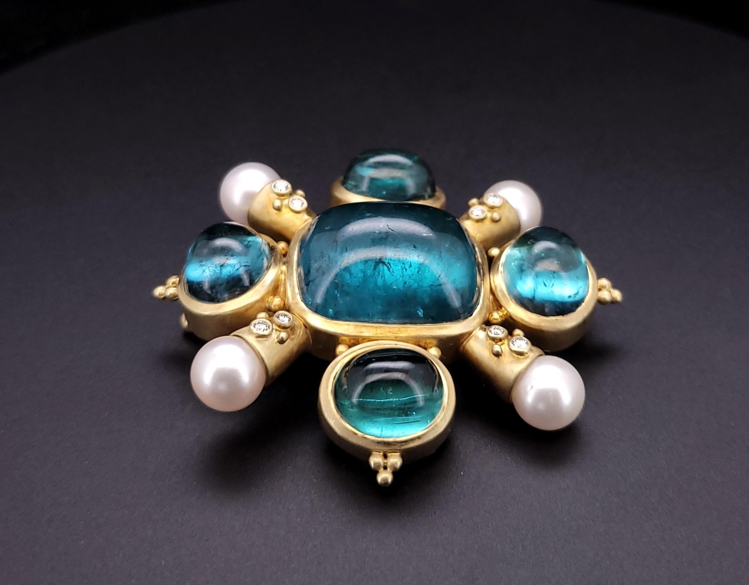Antike Brosche aus 18 Karat Gelbgold mit Aquamarin-Perlen und Diamanten 

Anhänger MATERIAL 18K Gelbgold

Diamant Karat: 0.05tcw
Aquamarine: Seitliche Steine  ~ 6 ct (jeder), Zentrum ~ 25 ct Stein
Perlen: 7,3 mm (jede)
Größe des Anhängers:
Gewicht: