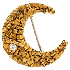 Broche ancienne en or jaune 18 carats pépite diamant croissant