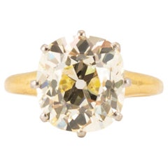 Bague de fiançailles ancienne en or jaune 18 carats et platine, sertie d'un diamant de 5,20 carats de taille « Old Mine » certifié par la GIA