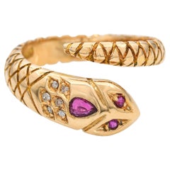 Bague serpent ancienne en or jaune 18k avec rubis et diamants