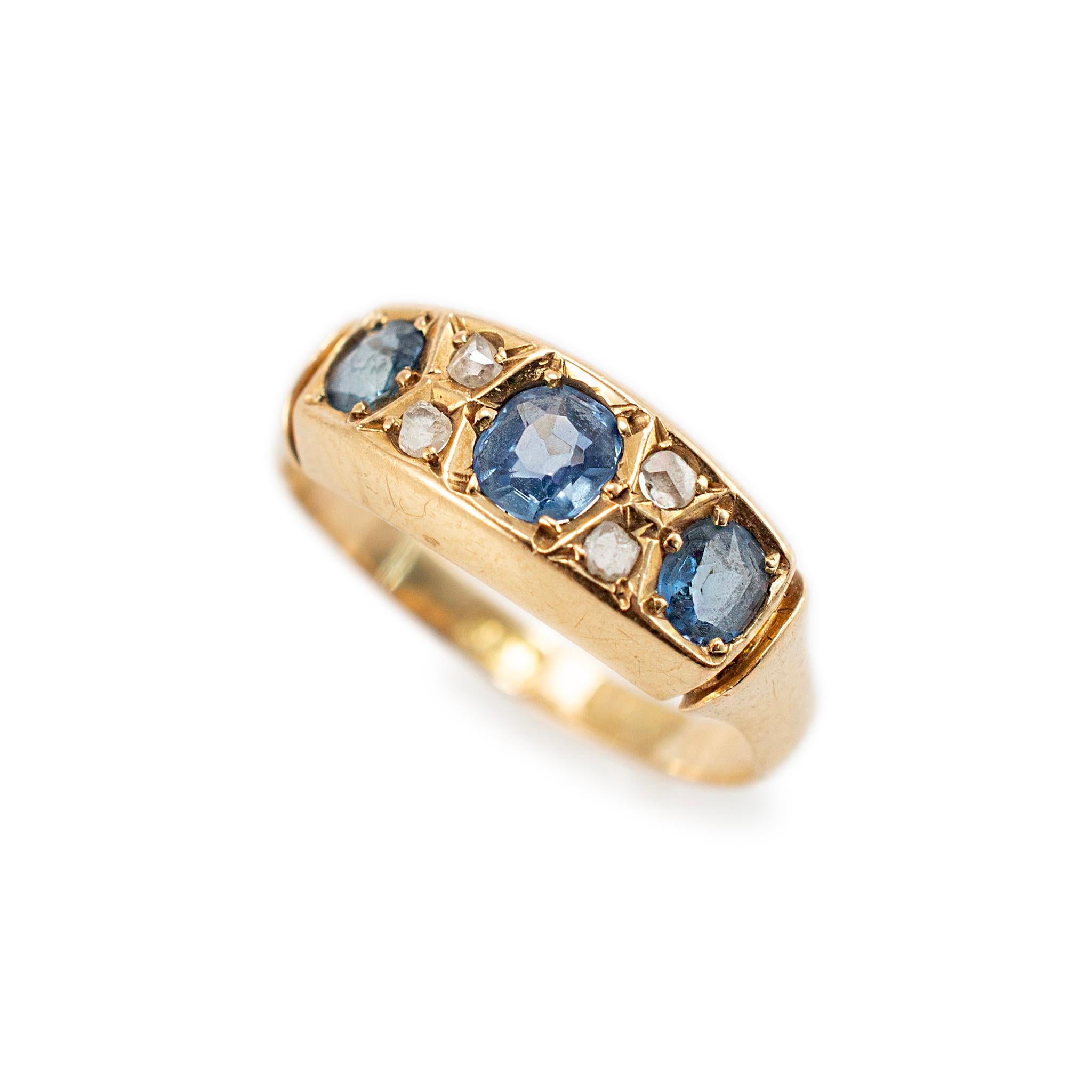 Gender: Ladies

Metal Type: 18K Yellow Gold

Ring Size: 3

Width: 6.25 mm tapering to 2.10 mm

Weight: 2.19 grams

One ladies 18K yellow gold diamond and sapphire antique cocktail ring with a half-round shank. The metal was tested and determined to