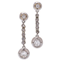 Boucles d'oreilles pendantes antiques en or 18kt avec diamants