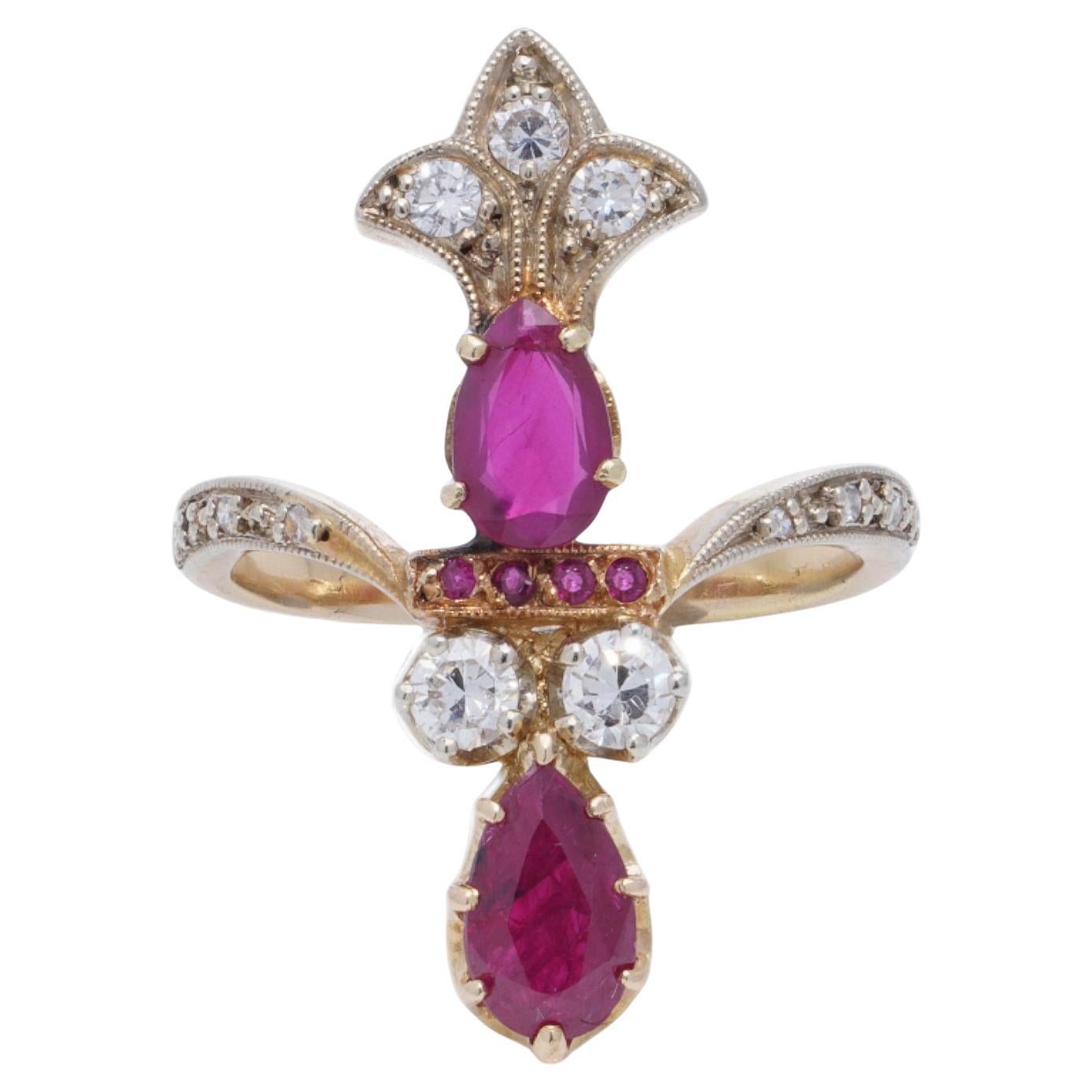 Antique 18kt Gold Ladies Ring with Natural Burma Rubies and Diamonds

This antique ring was crafted in 18kt gold during the 1930s-1940s. Its design showcases the artistry of the era, featuring natural Burma rubies and dazzling