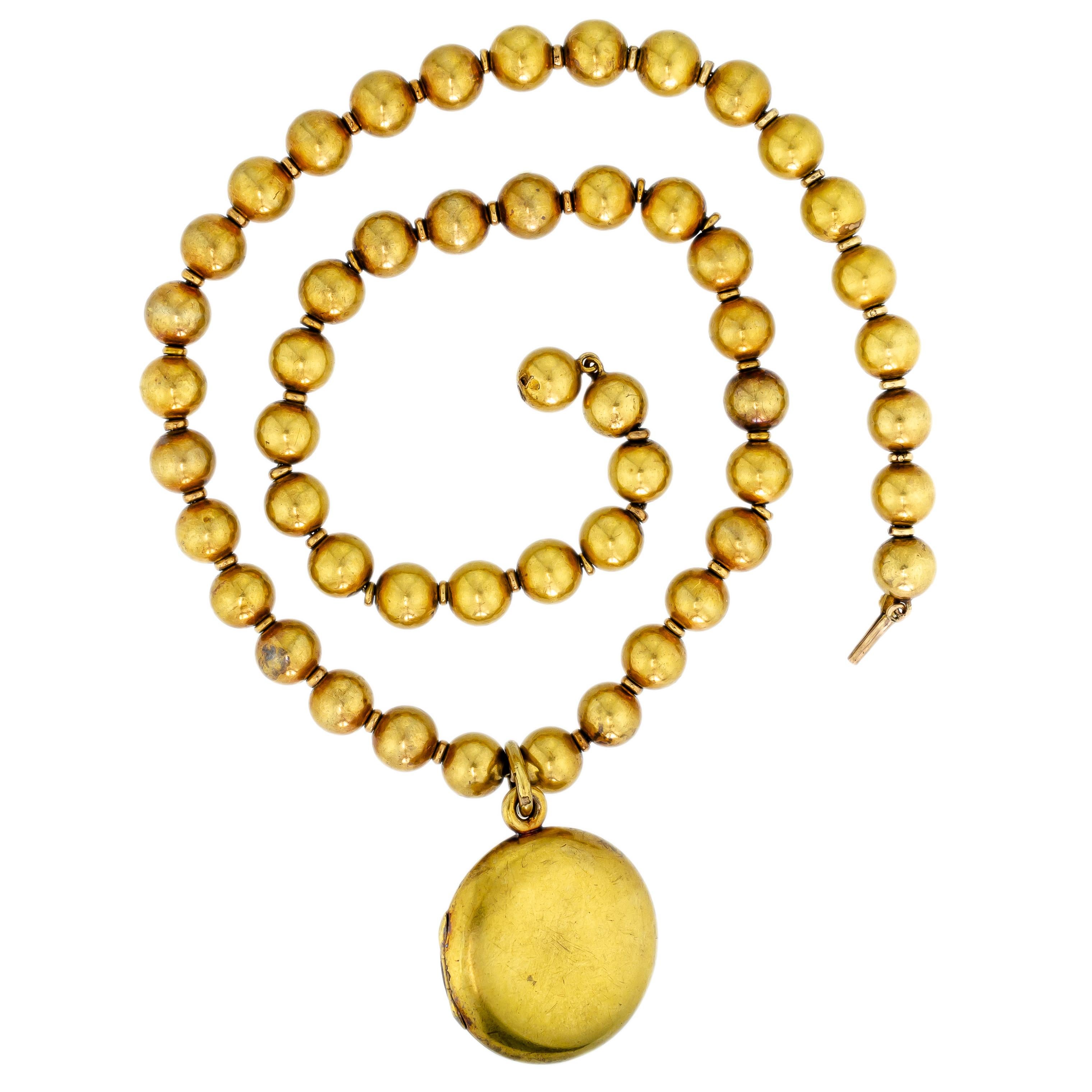 Antike antike Halskette aus 18 Karat Gelbgold mit Kugeln und Medaillon im Angebot 1