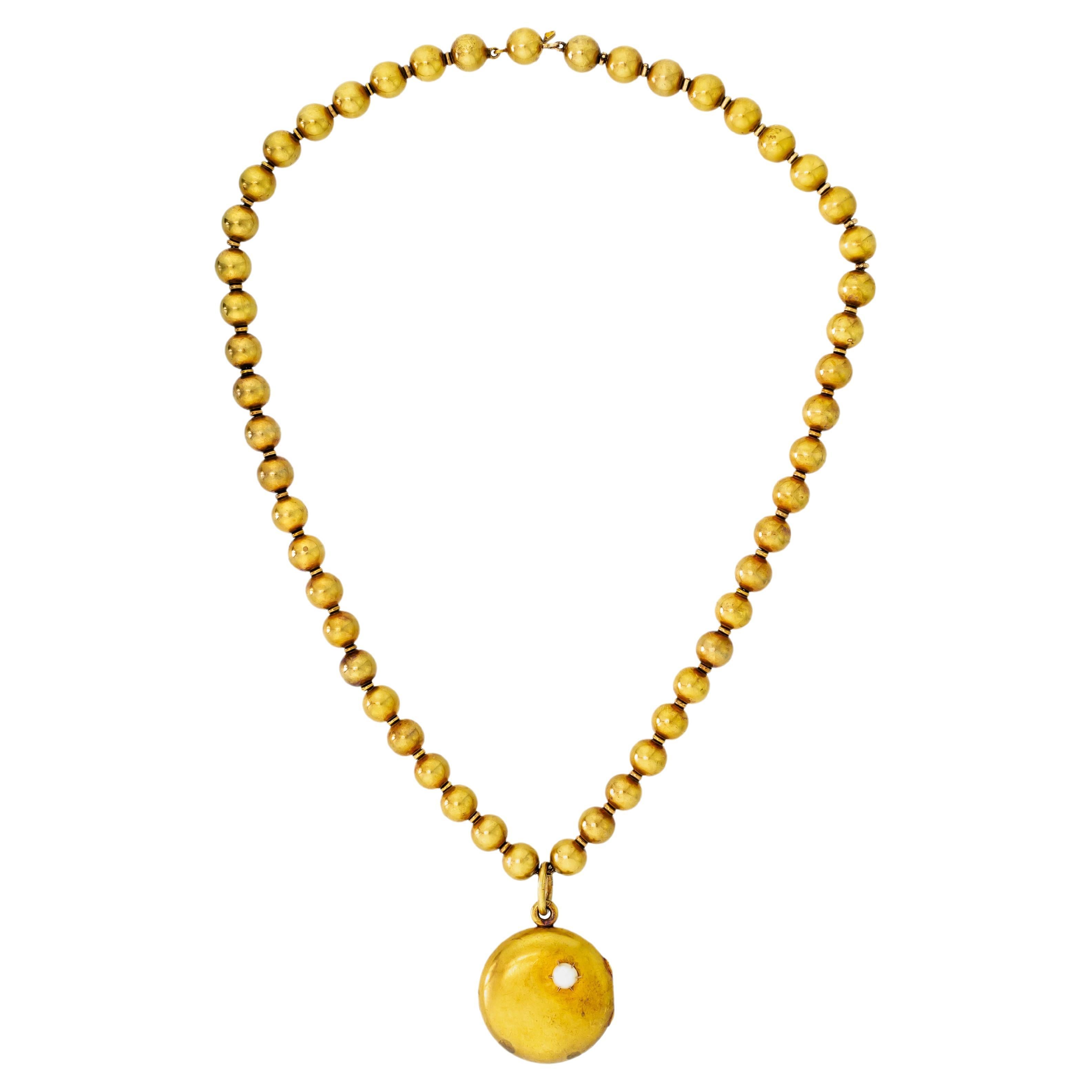 Antike antike Halskette aus 18 Karat Gelbgold mit Kugeln und Medaillon im Angebot