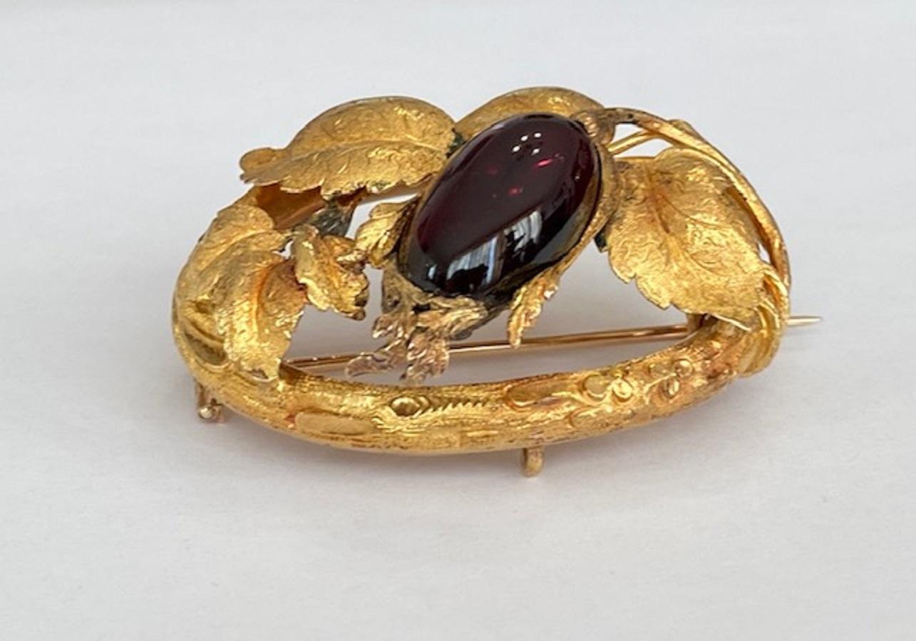 Cabochon Antique 18kt yellow Gold Brooch with ca 18.00 ct garnet For Sale
