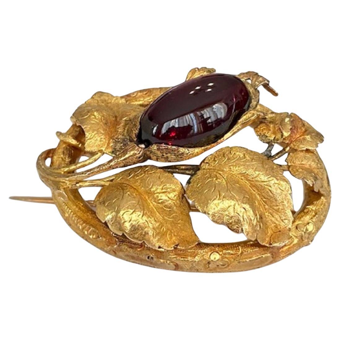 Antique 18kt yellow Gold Brooch with ca 18.00 ct garnet