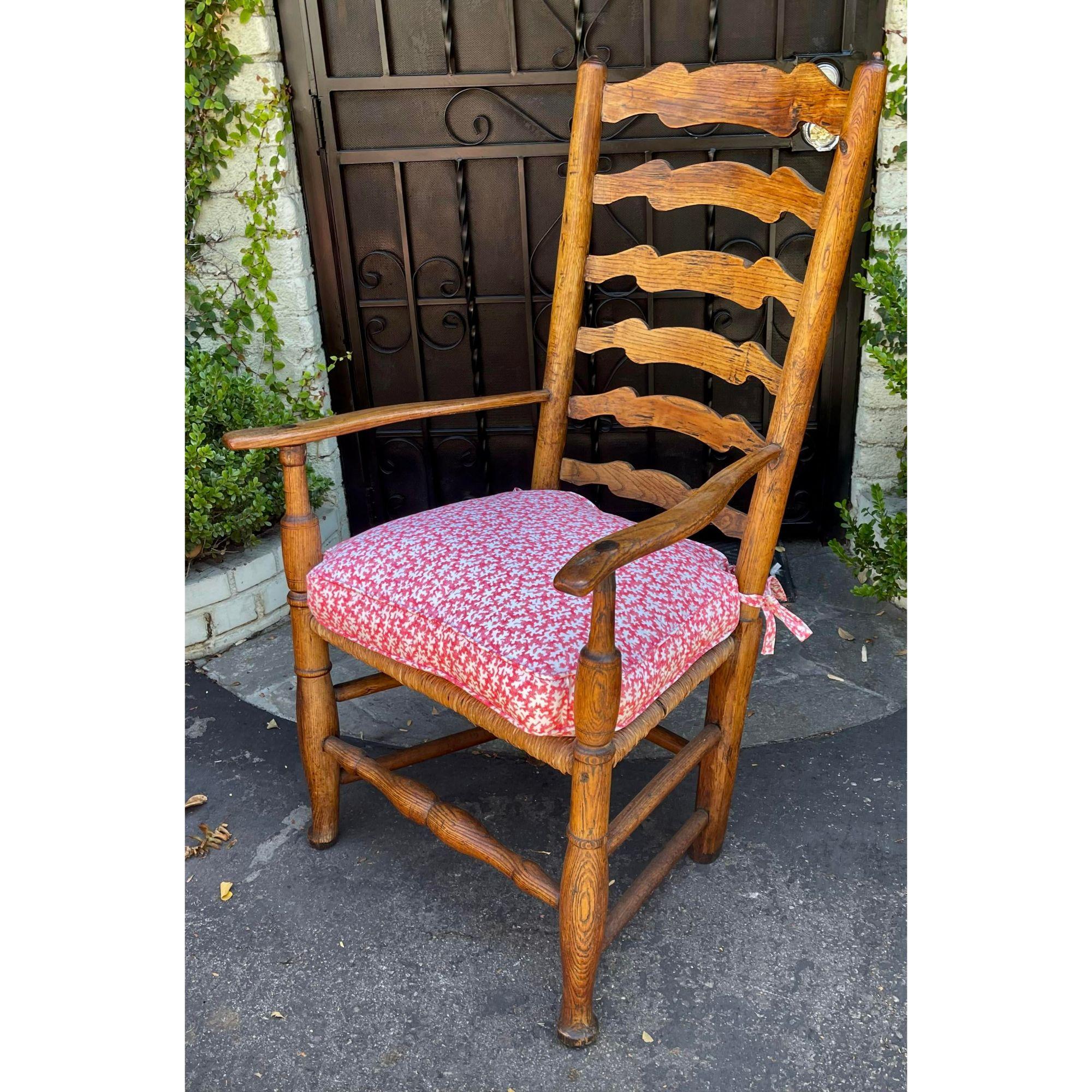 Priced Each.
Antique 18th century American Ladder Back armchair with Scalamandre Down Cushion

Additional information: 
Materials: Cotton, Feather, Oak, Rush
Color: Pink
Period: 18th century
Styles: American
Number of Seats: 1 
Item Type: