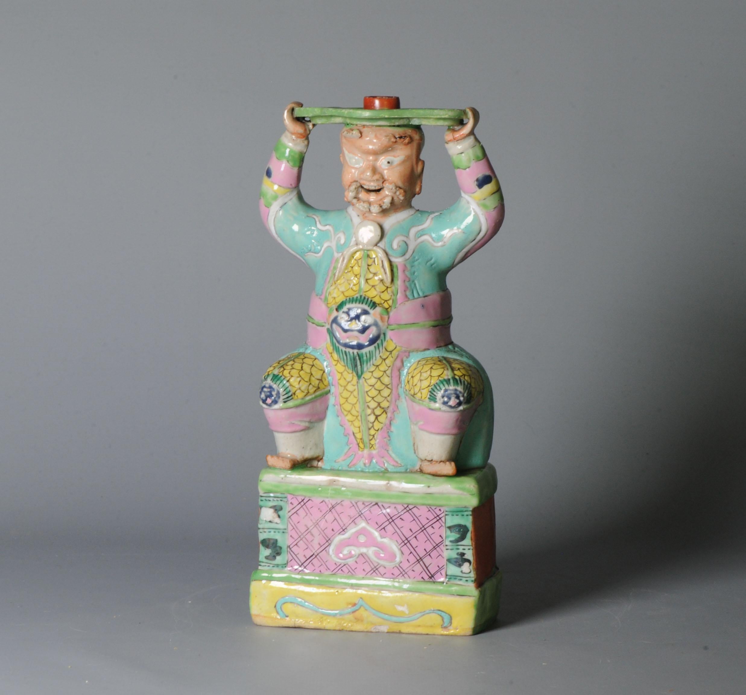 Description
Very interesting and beautiful statue of a figure holding a piece above his head. Which figure it is will need to be investigated. Could be The Chinese military god of wealth, also known as General Zhao Kong Ming, is a revered deity