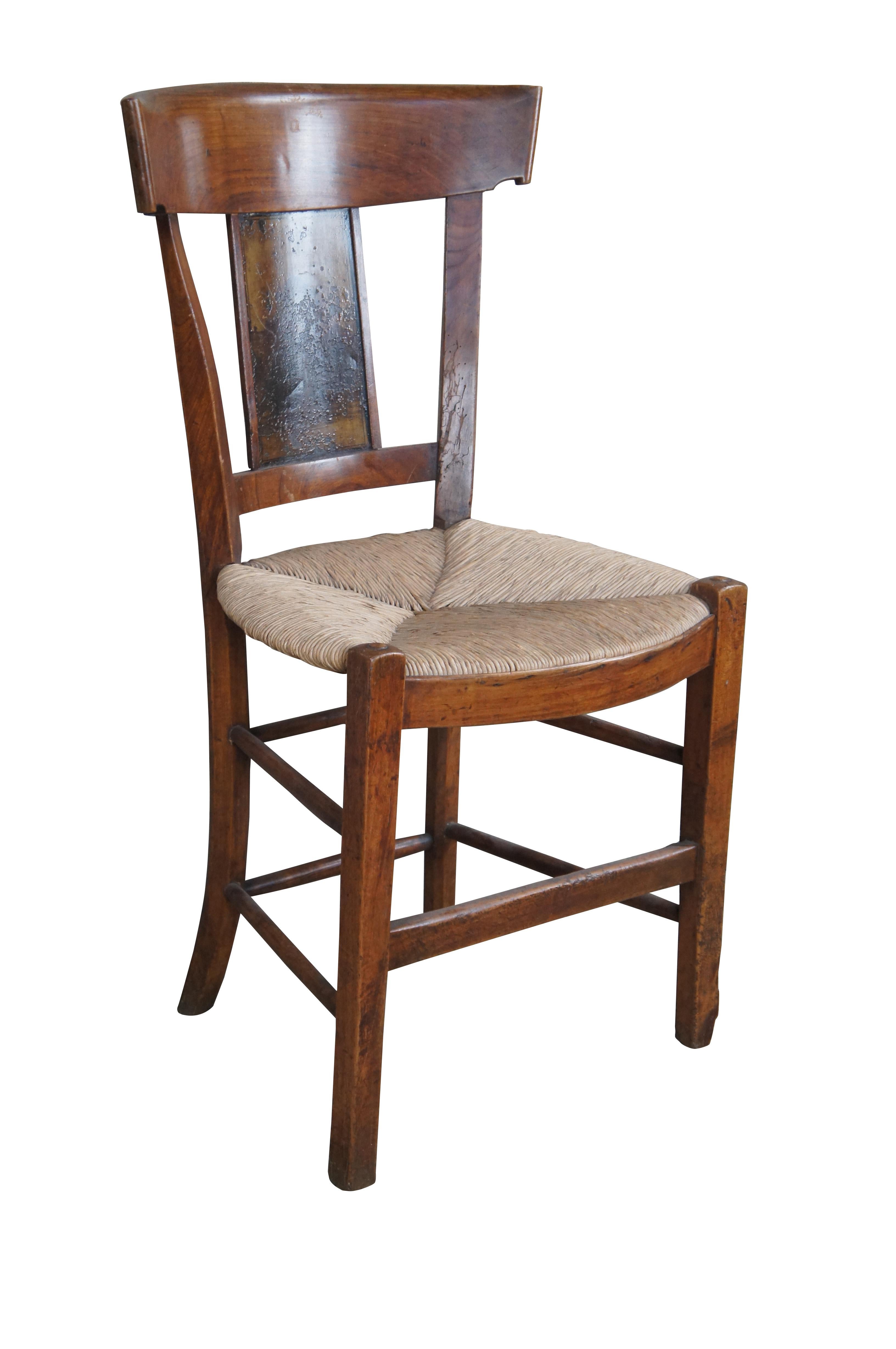 Charming Late 18th Century French Neoclassical Directoire Chair.  Made from cherry with a contoured back over a tole peinte or lacca contrafatta panels showcasing an old landscape / temple cityscape scene.  Lacca Contrafatta was a popular form of