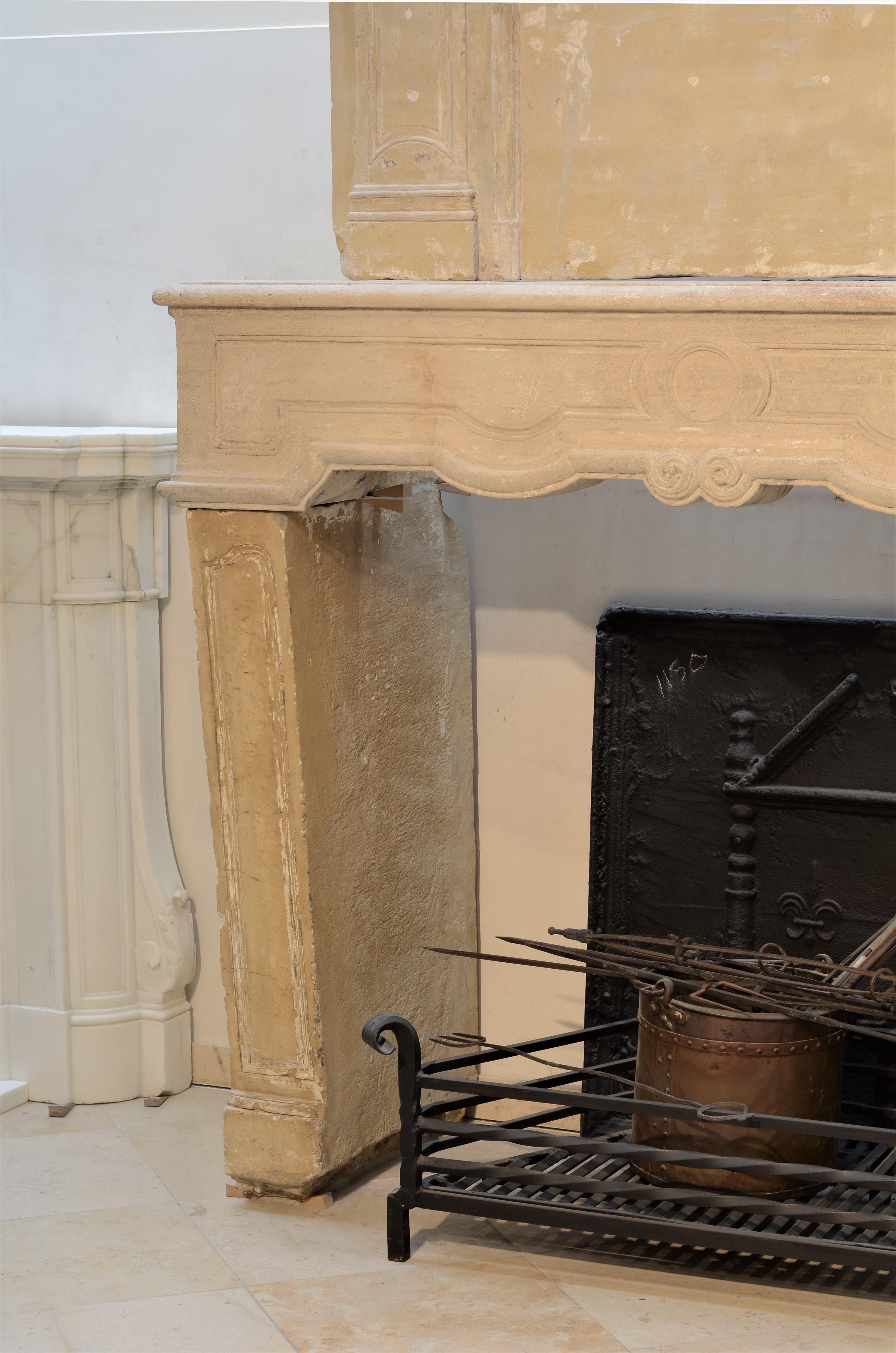 Limestone Antique 18th Century French Louis XIV Fireplace Mantel with Trumeau For Sale
