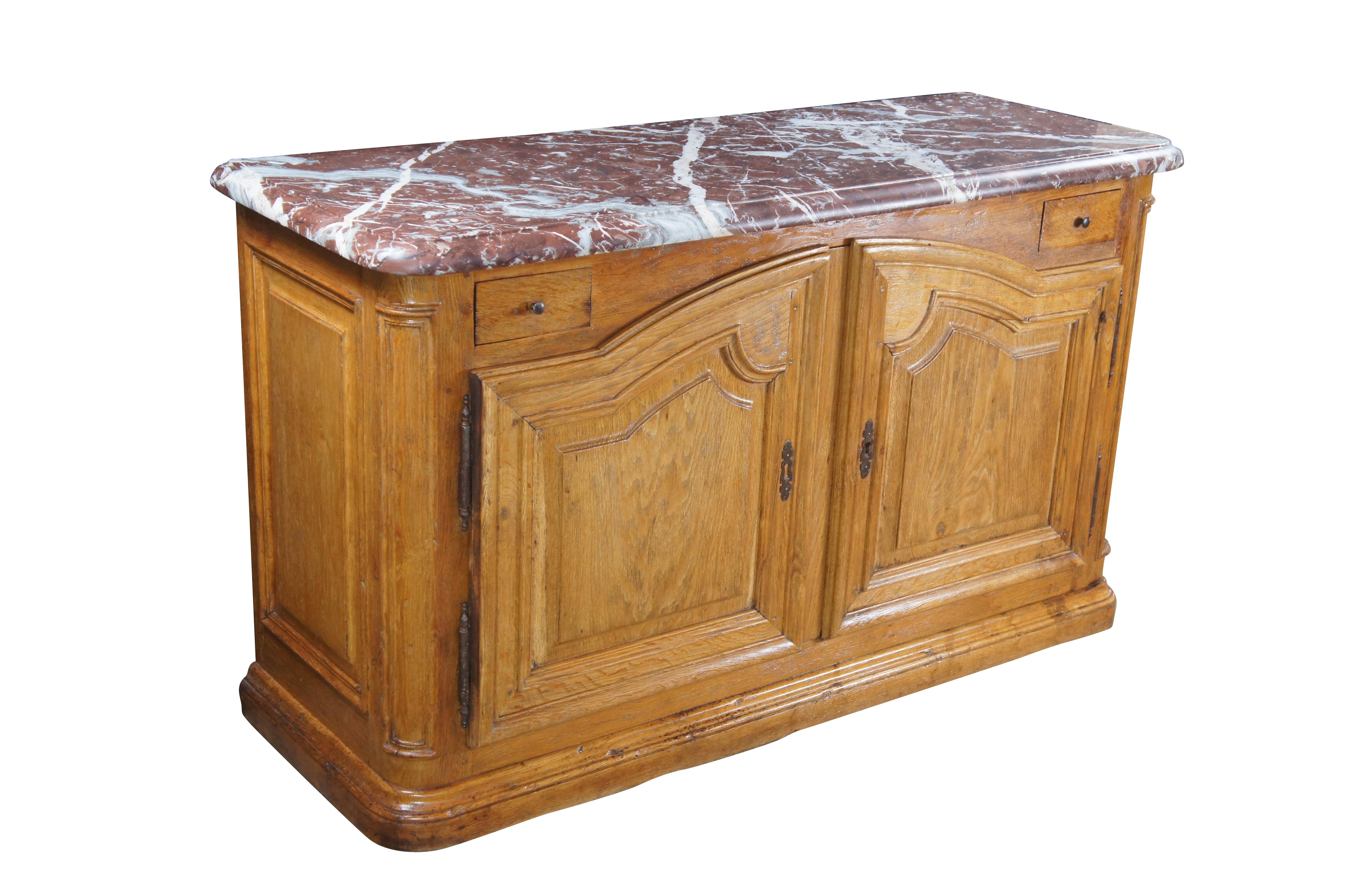 Striking Mid 18th Century French Louis XIV style Hunting Cabinet.  Made from oak with a thick ruege marble beveled top over an oak case with two hand dovetailed knife drawers and a larger lower domed cabinet for storage with working lock and key. 