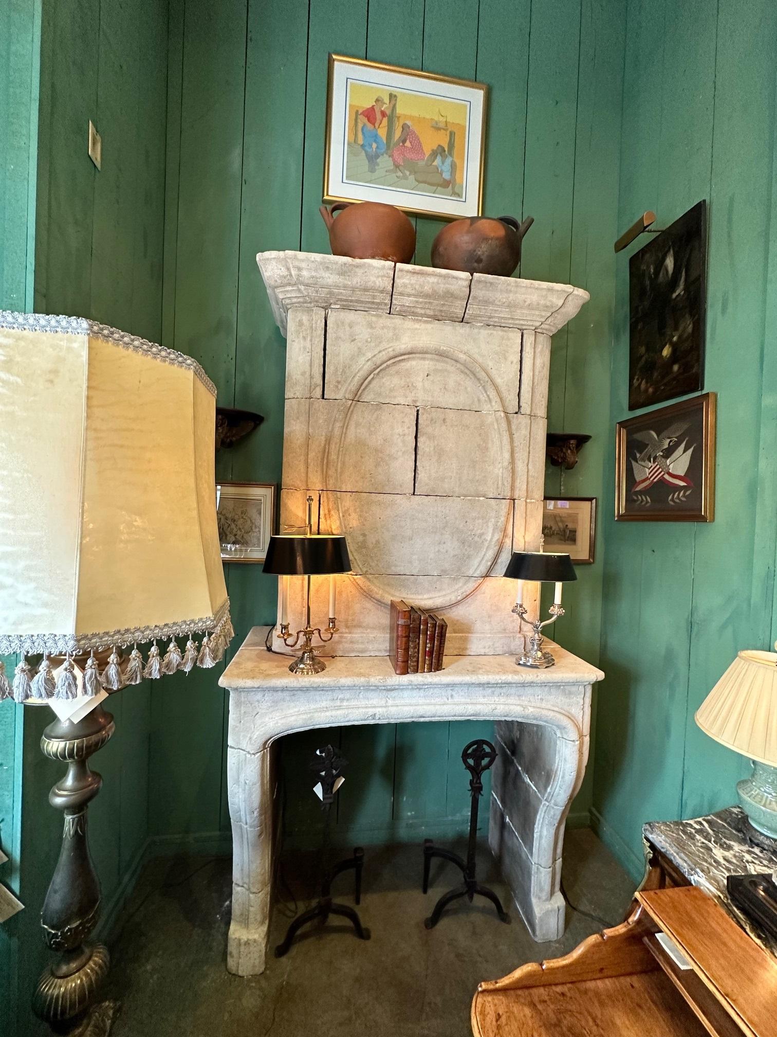 Antique 18th C. Hand Carved Stone Fireplace Mantle Chimney Mantelpiece Surround . Gorgeous antique Hand Carved limestone fireplace from Provence. 18th century Louis XIV cheminee trumeau mantle . Beautiful hand carved simple Lines exudes elegance