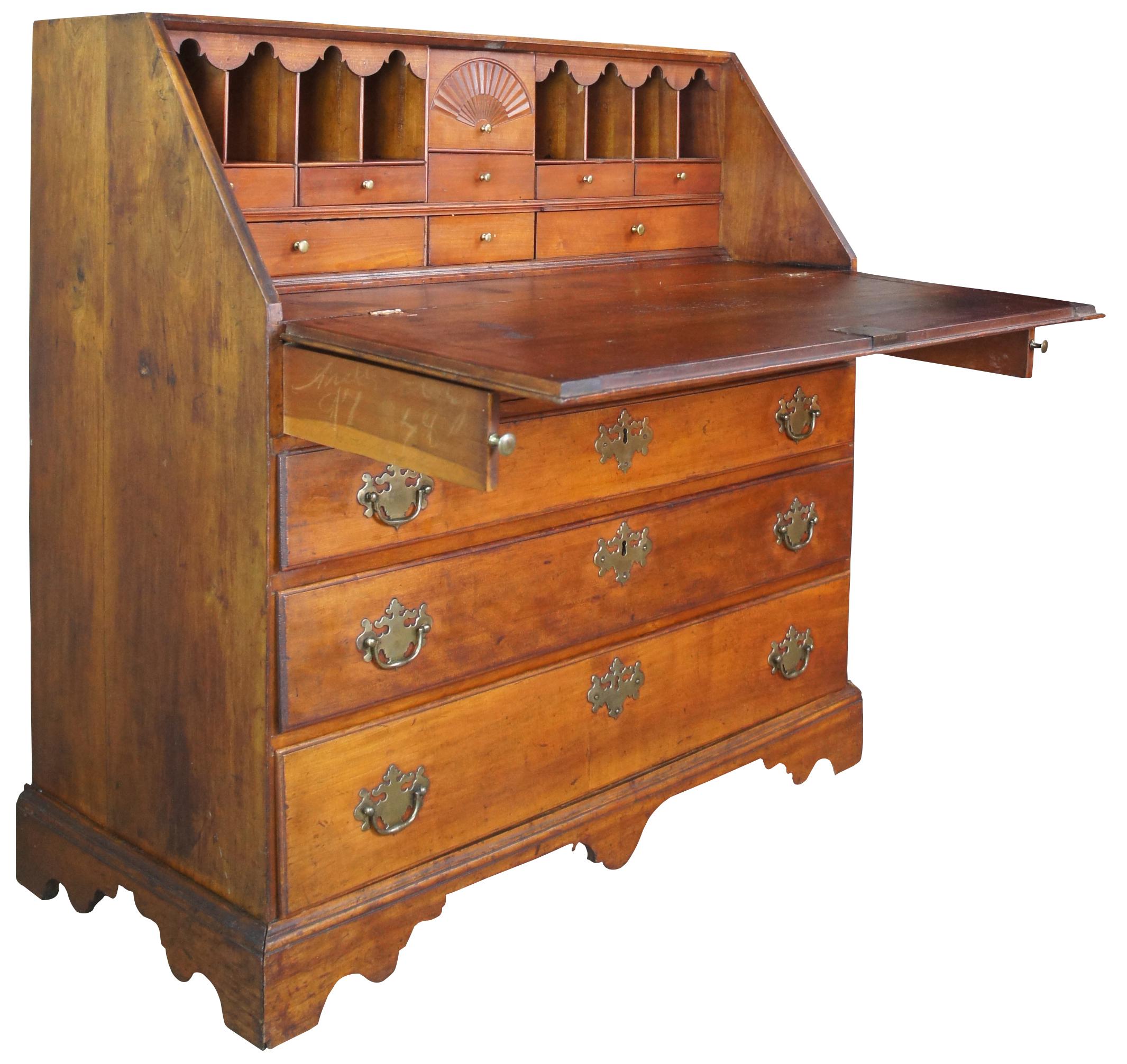 Exquisite and Rare antique American Chippendale Period secretary writing desk or Escritoire. Made from maple featuring a flip top that opens to a fan carved interior and multiple drawers for file storage. The case is constructed via hand dovetailed