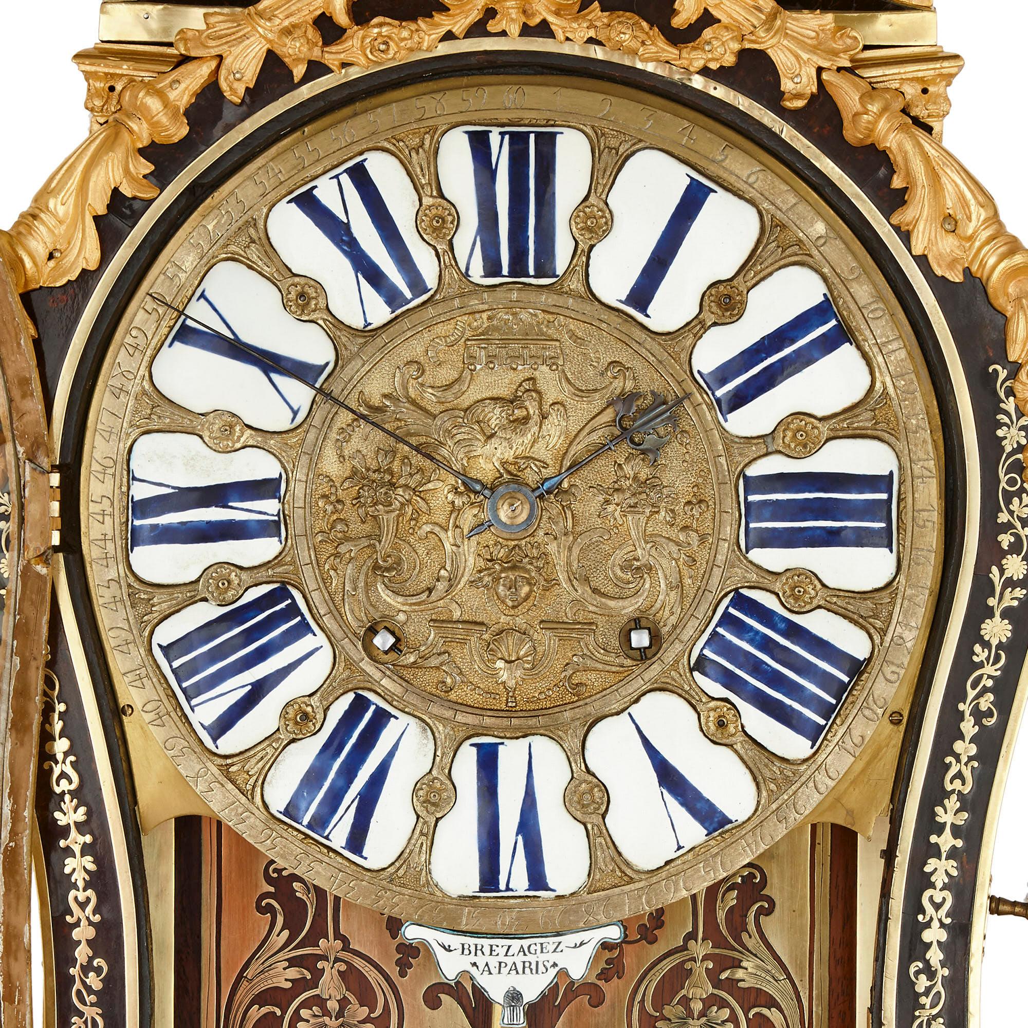 Antique 18th century Boulle bracket clock by Brezagez and Marchand
French, circa 1740
Measures: Clock: Height 87cm, width 47cm, depth 21cm
Bracket: Height 40cm, width 53cm, depth 24cm
Total: Height 127cm

This beautiful 18th century French