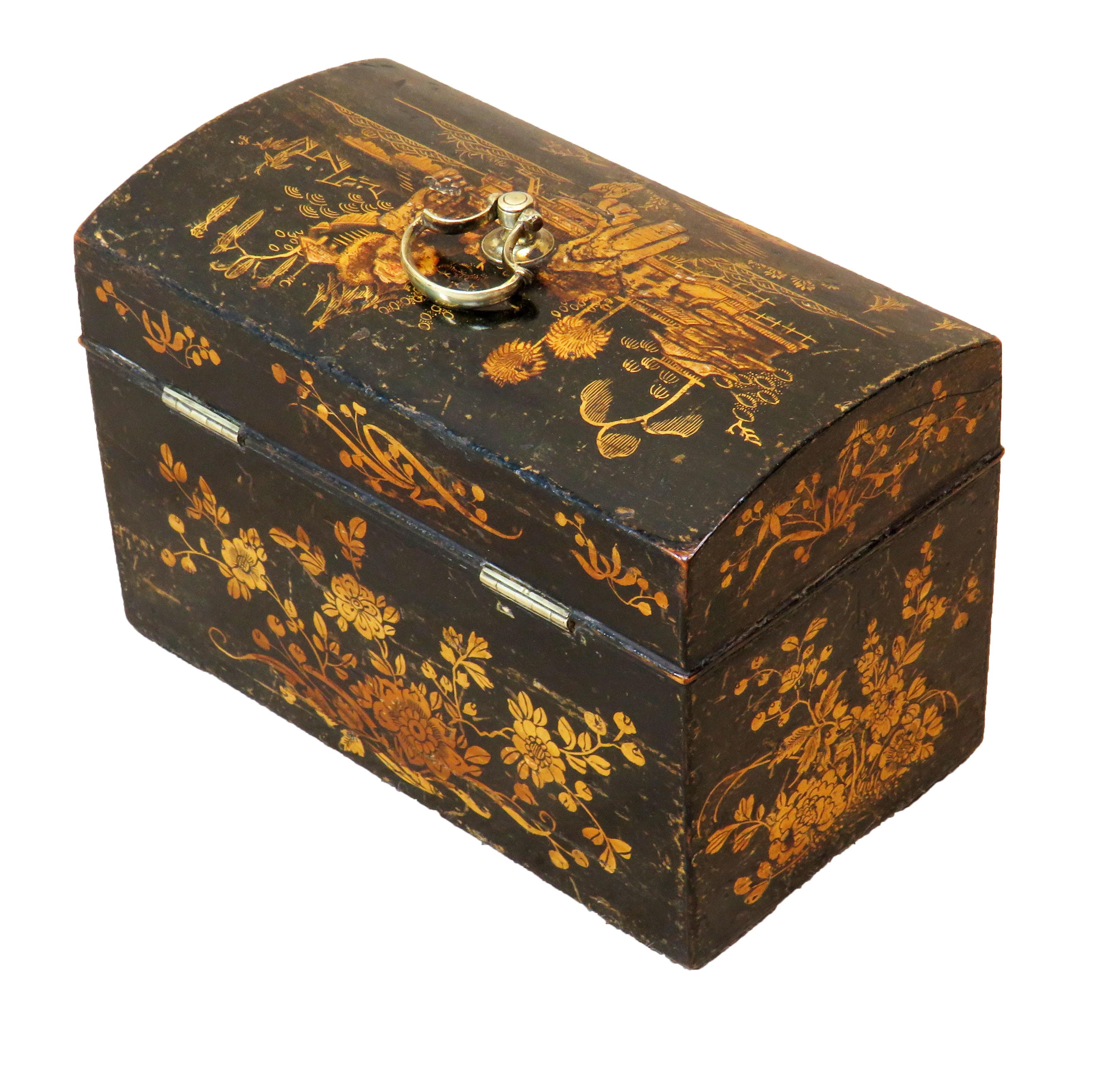 A delightful late 18th century Georgian chinoiserie
Painted and decorated tea caddy having domed lift
Up top retaining original brass axe drop handle

(Dating to the 18th century this tea caddy has certainly seen 
some life. Although the